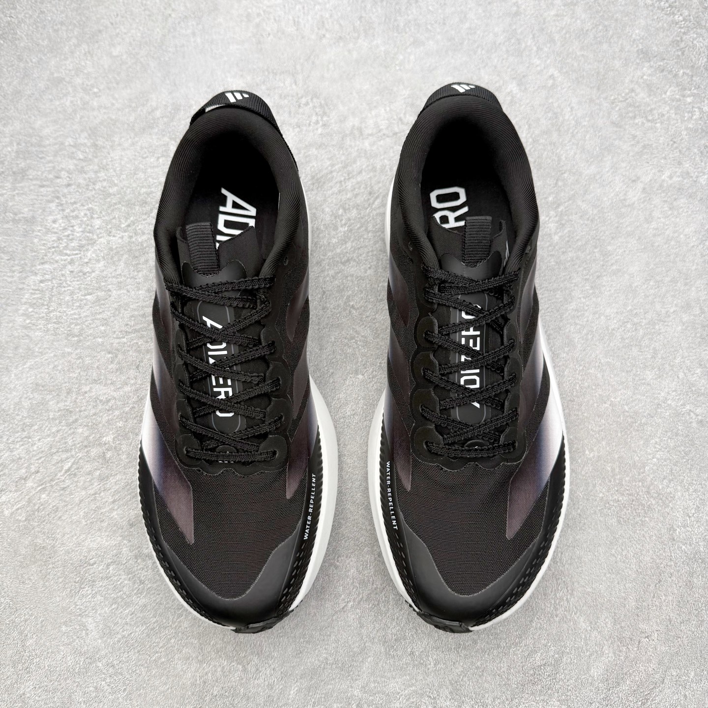 图片[2]-AD Adizero EVO SL ATR M 马拉松竞速专业跑鞋 CELERMESH针织网面非常轻薄 纤维间的缝隙很大 可以保证跑步时的透气、排汗效果 鞋舌直接与两侧的内衬和鞋底连接在一起 在跑步过程中不会被鞋舌的左右移动所困扰 在标准鞋带孔的基础上再拓宽一组鞋带孔 适合不同脚型的需求 突破性 EnergyRods 技术，有助于跑者实现更好的成绩 中底独特的LIGHTSTRIKE PRO泡棉材质 微弹感觉在跑步过程中给予了良好的支撑体验 对于顶级精英和高水平进阶跑者来说 ADIOS PRO是一双值得信赖的竞速比赛用鞋 尺码：36 36.5 37.5 38 38.5 39 40 40.5 41 42 42.5 43 44 44.5 45-选品中心