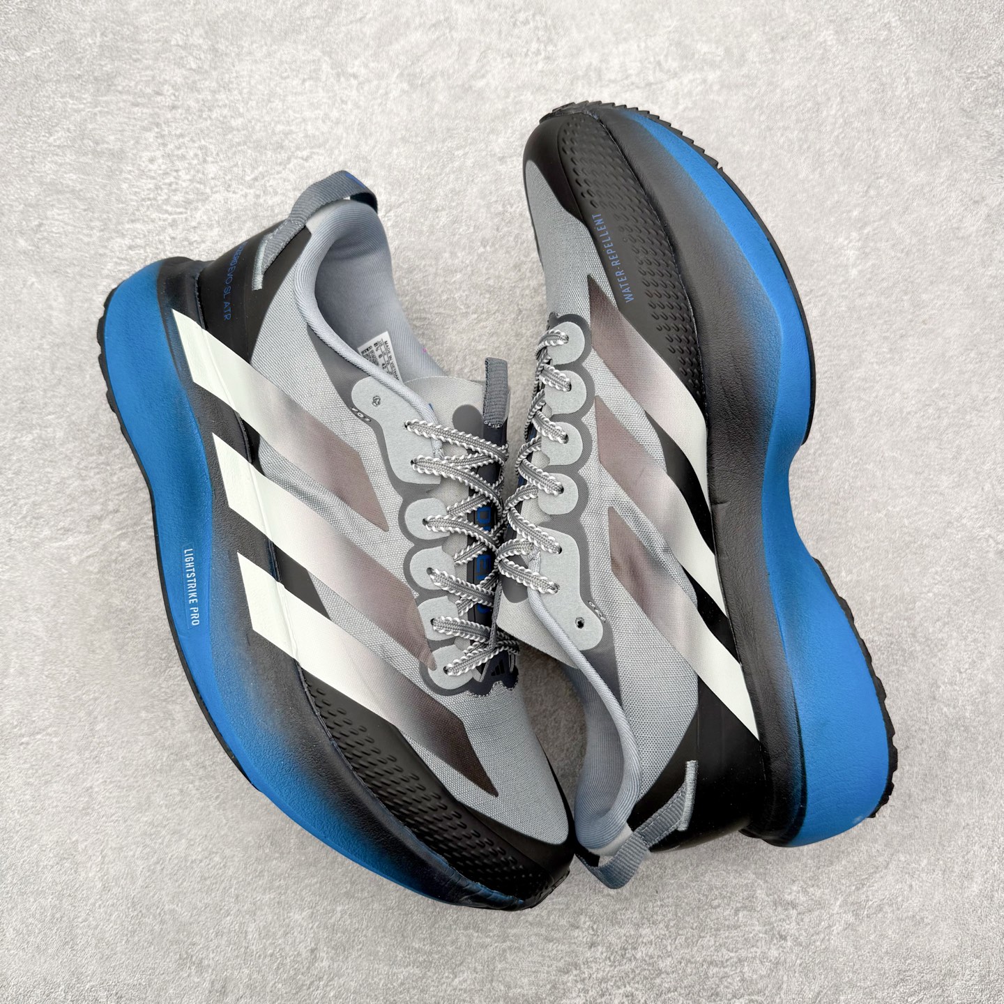 图片[3]-AD Adizero EVO SL ATR M 马拉松竞速专业跑鞋 CELERMESH针织网面非常轻薄 纤维间的缝隙很大 可以保证跑步时的透气、排汗效果 鞋舌直接与两侧的内衬和鞋底连接在一起 在跑步过程中不会被鞋舌的左右移动所困扰 在标准鞋带孔的基础上再拓宽一组鞋带孔 适合不同脚型的需求 突破性 EnergyRods 技术，有助于跑者实现更好的成绩 中底独特的LIGHTSTRIKE PRO泡棉材质 微弹感觉在跑步过程中给予了良好的支撑体验 对于顶级精英和高水平进阶跑者来说 ADIOS PRO是一双值得信赖的竞速比赛用鞋 尺码：36 36.5 37.5 38 38.5 39 40 40.5 41 42 42.5 43 44 44.5 45-选品中心