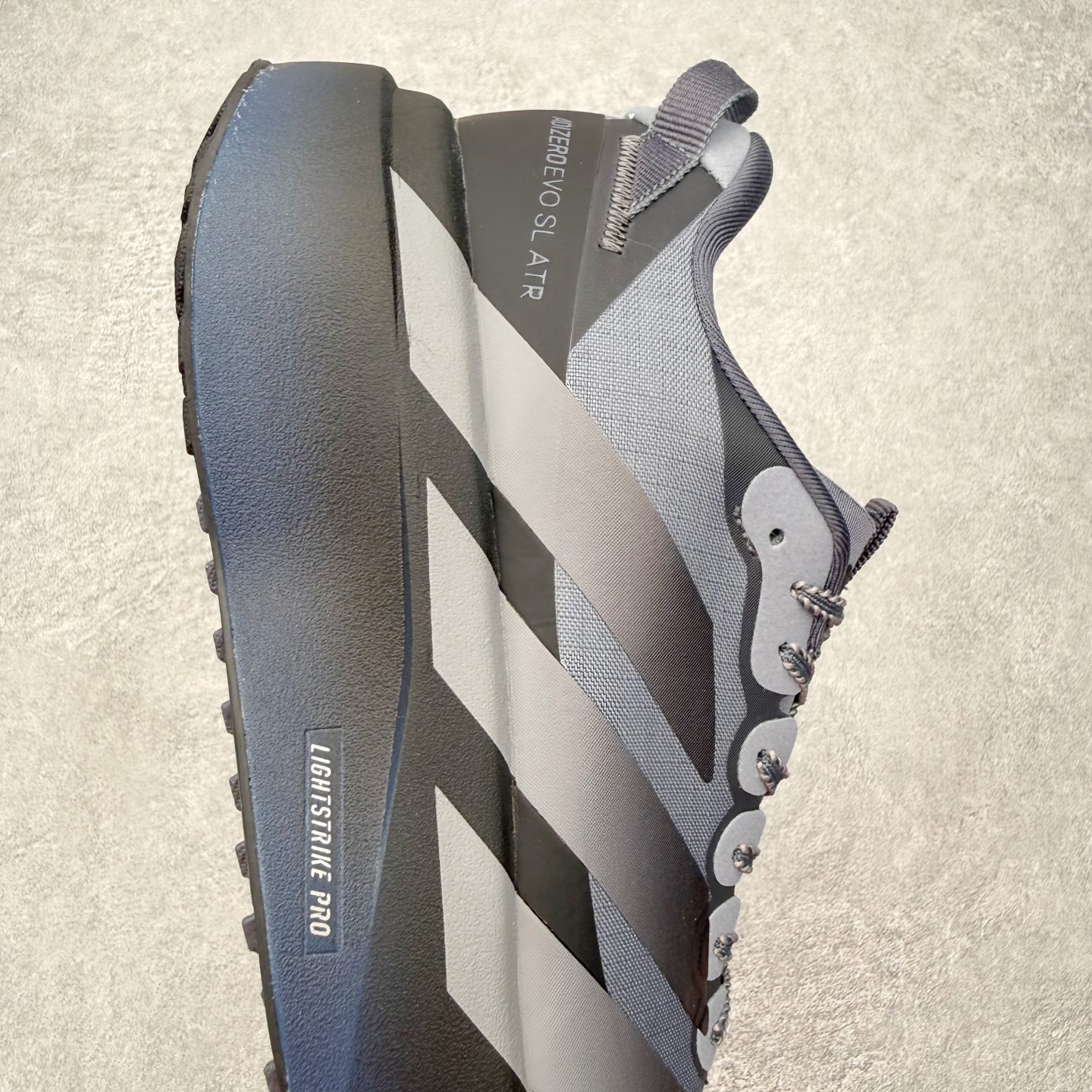 AD Adizero EVO SL ATR M 马拉松竞速专业跑鞋 CELERMESH针织网面非常轻薄 