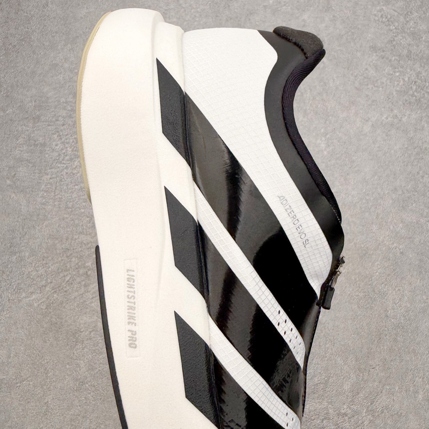 AD Adizero EVO SL Zip 马拉松竞速专业跑鞋 CELERMESH针织网面非常轻薄 纤维