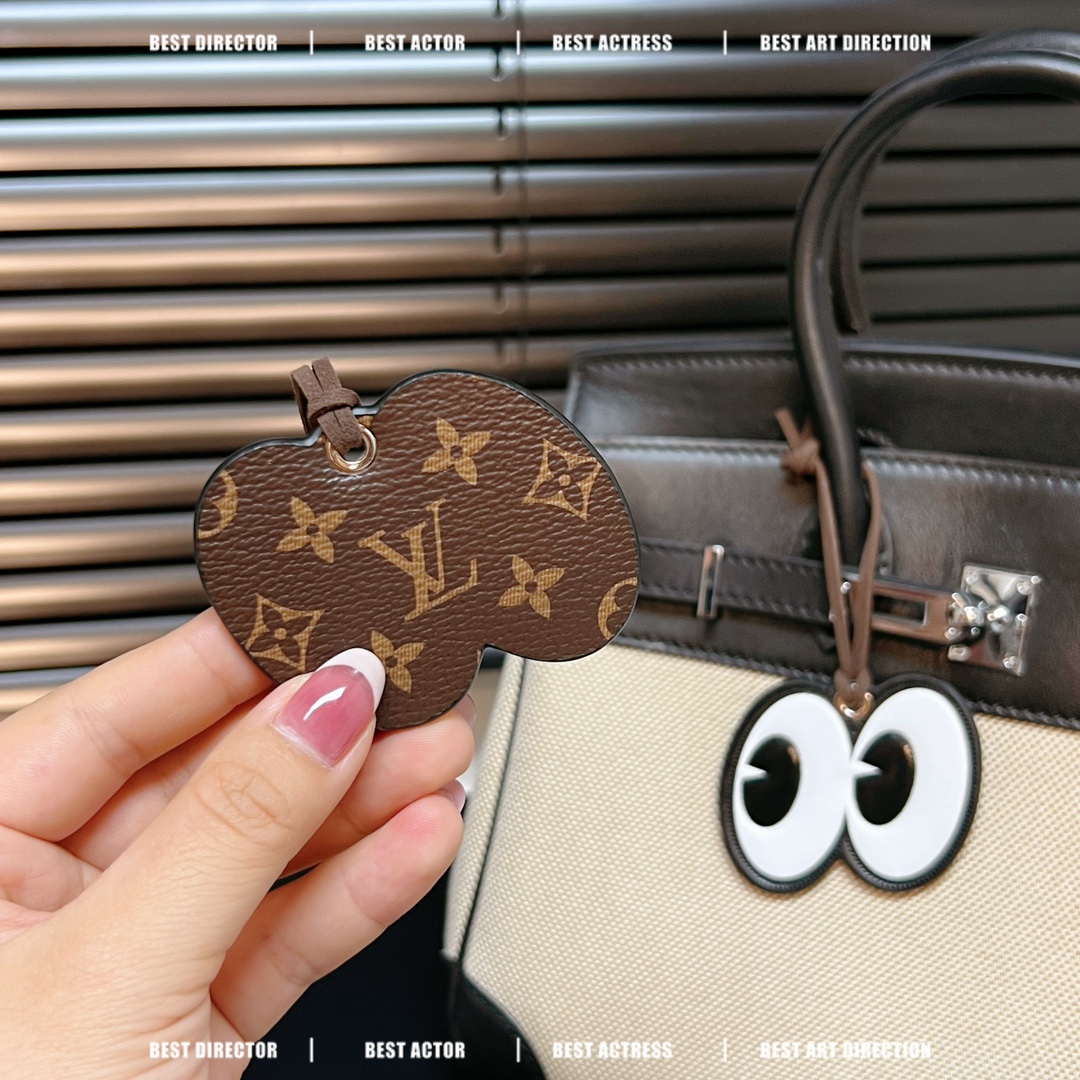 LV Mister Keepall Keychain in Hand