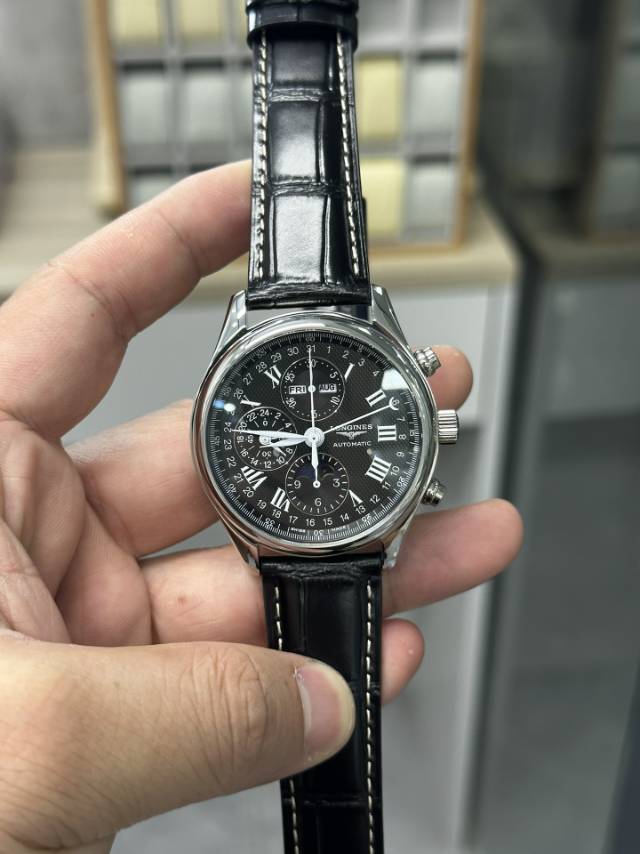 NO:392787,GS eight-pin Longines has complex and multi-functional moon phase, equipped with the latest Dandong 7751 movement, with a greatly improved stability performance. It is no longer a watch kept by the watch repair master. It is 42MM, and there is no flaw in the bottom!  Three codes in one, longines19860909GS八针浪琴月相复杂多功能,搭载最新丹东7751机芯,稳定性能大大提升,不再是修表师傅代为保管的表,42MM,透底也无破绽！三码合一,,longines,Watch