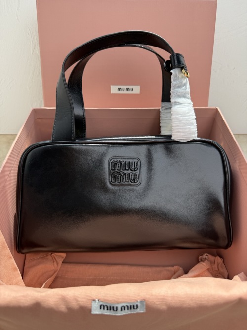 Miu Miu Bowling Bag in Shiny Leather with Embossed Logo, 28 x 15 x 13 cm 1 Miu Miu Bowling Bag in Shiny Leather with Embossed Logo, 28 x 15 x 13 cm