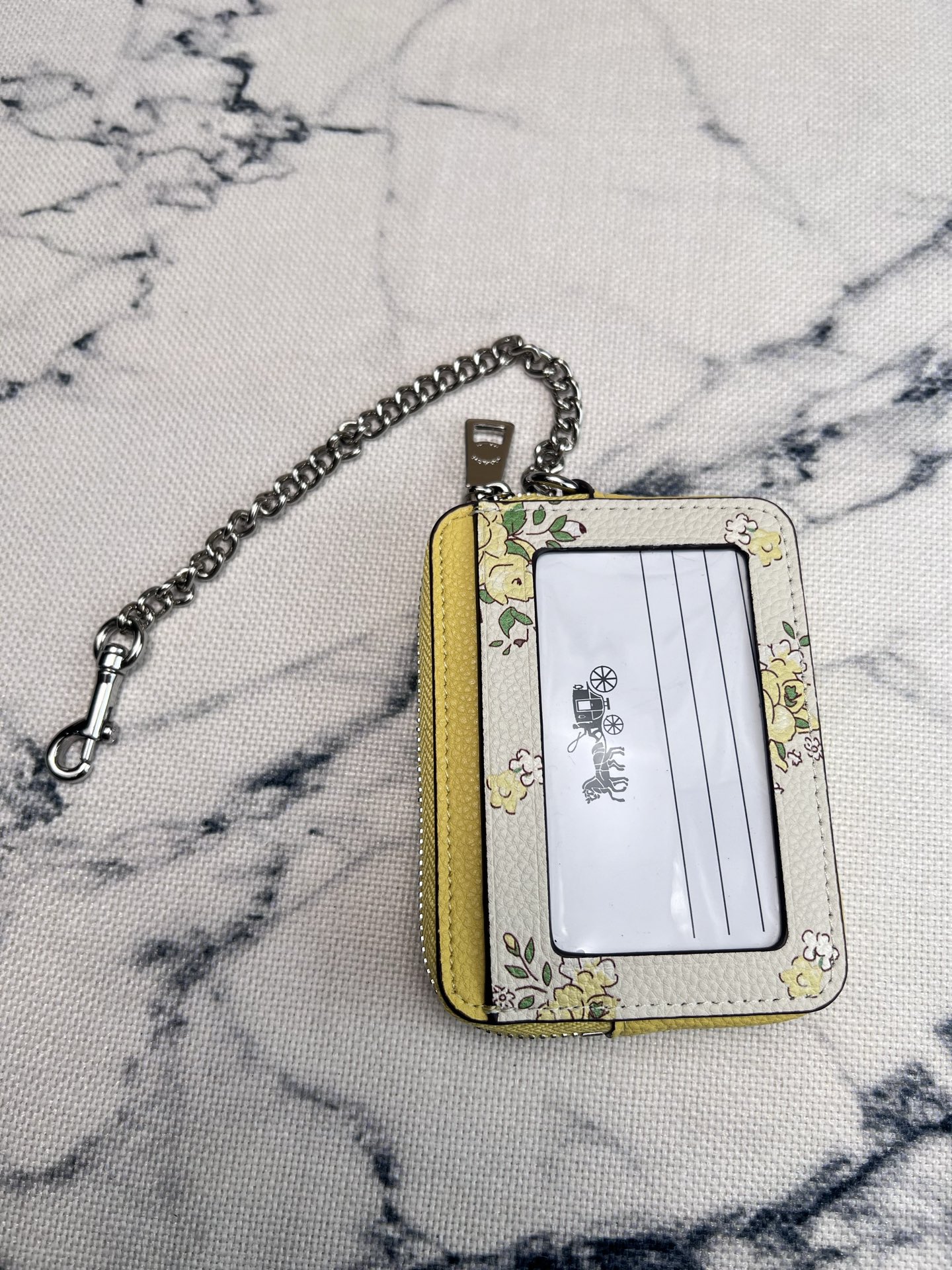 Coach ～COACH蔻驰 CAU44荔枝纹黄色花卉印花