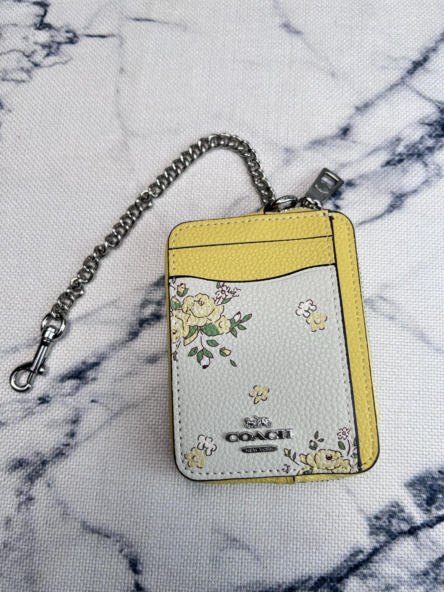 Coach ～COACH蔻驰 CAU44荔枝纹黄色花卉印花