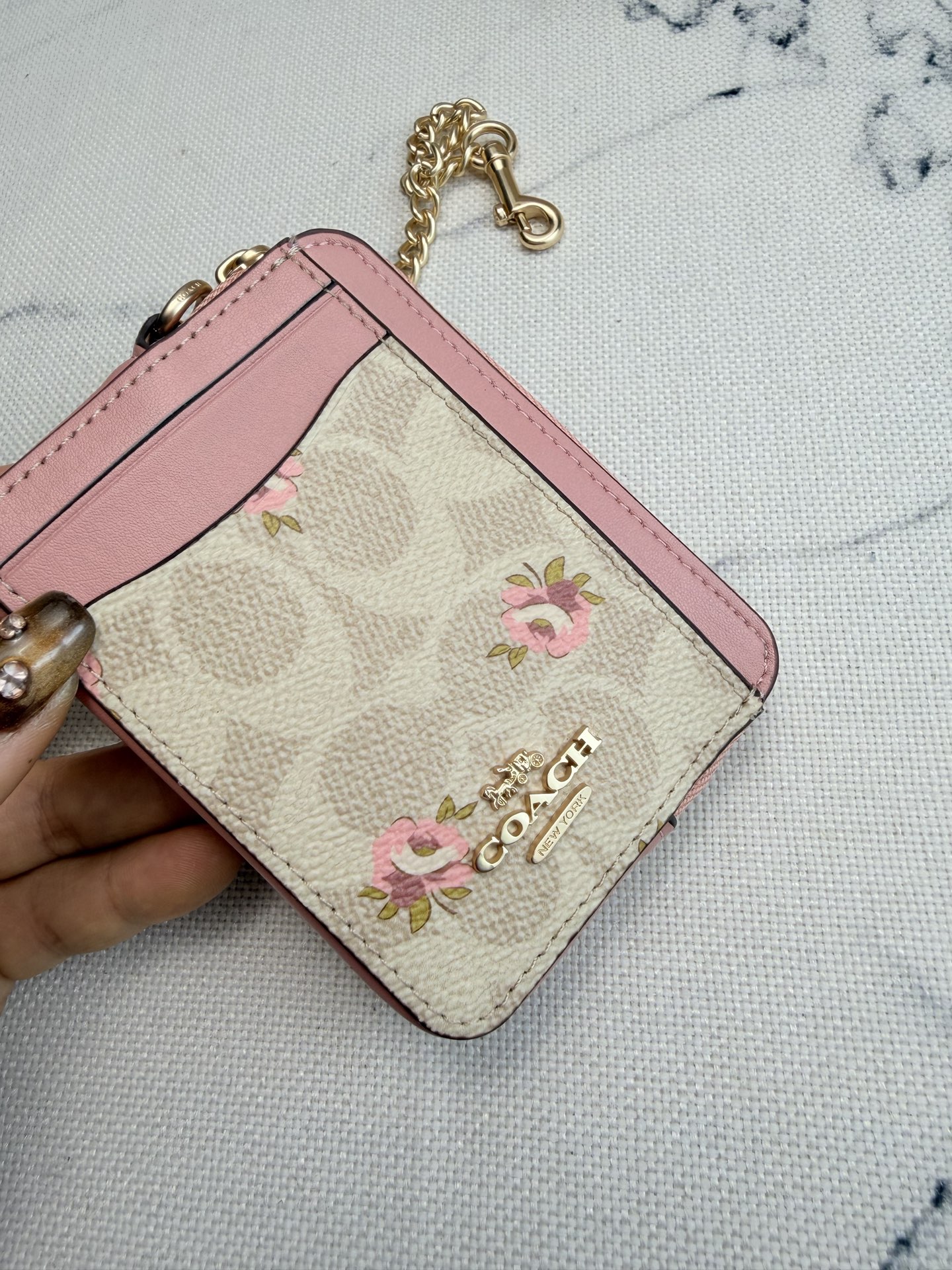 Coach Coach粉色花卉CAU45链条卡包
