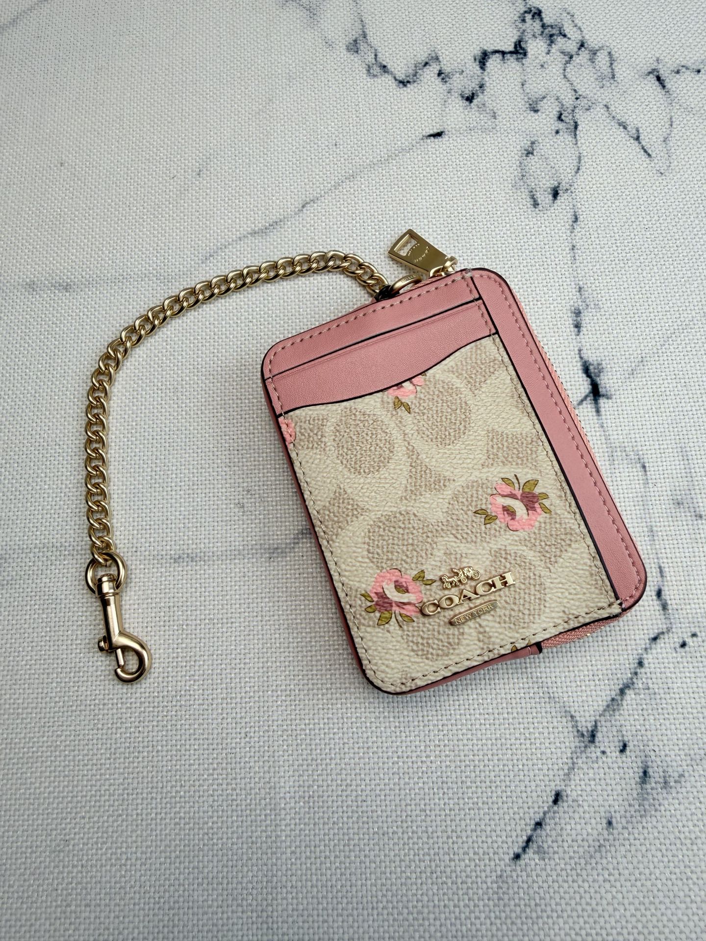 Coach Coach粉色花卉CAU45链条卡包