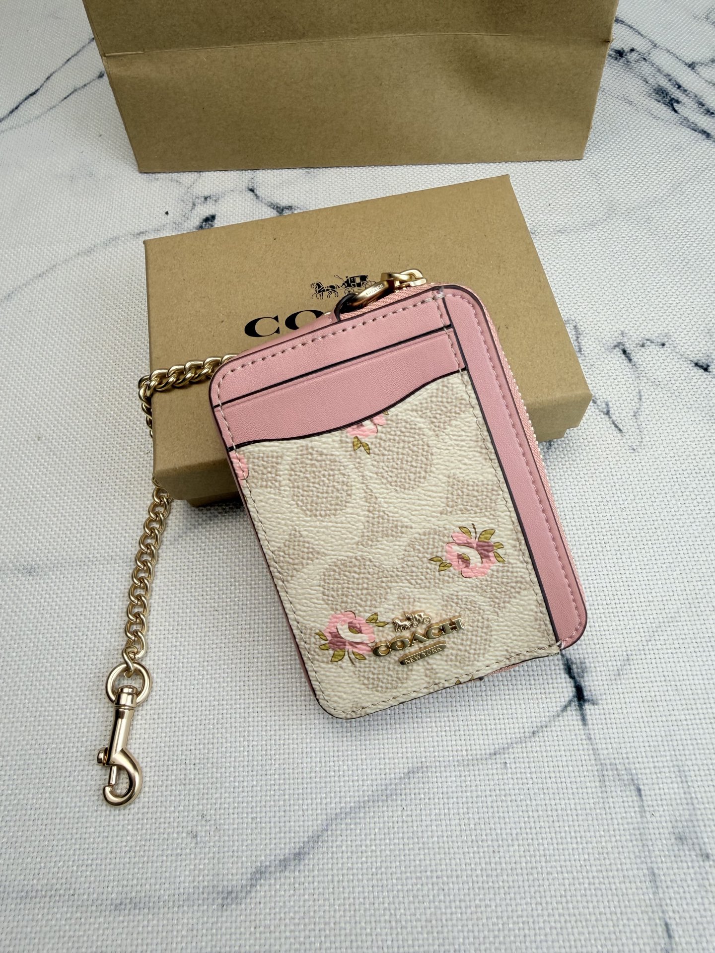 Coach Coach粉色花卉CAU45链条卡包