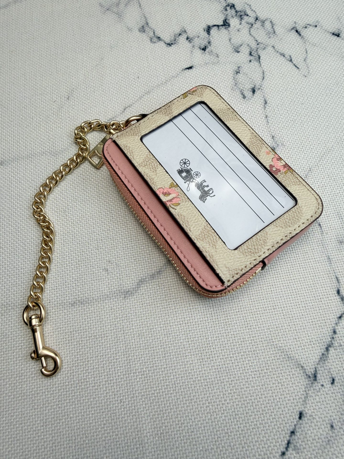 Coach Coach粉色花卉CAU45链条卡包