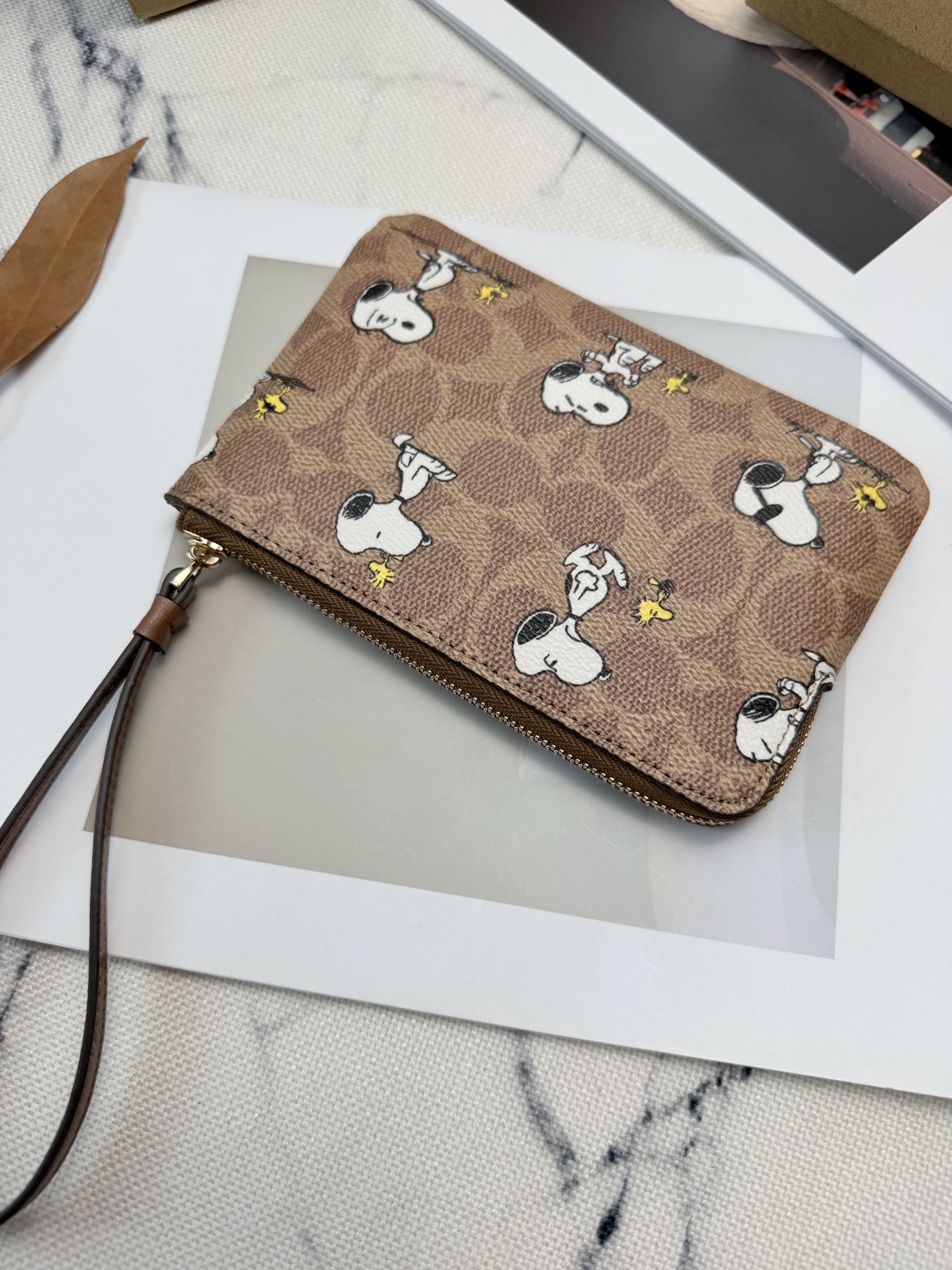 Coach COACH x PEANUTS史努比联名SBS82手拿包
