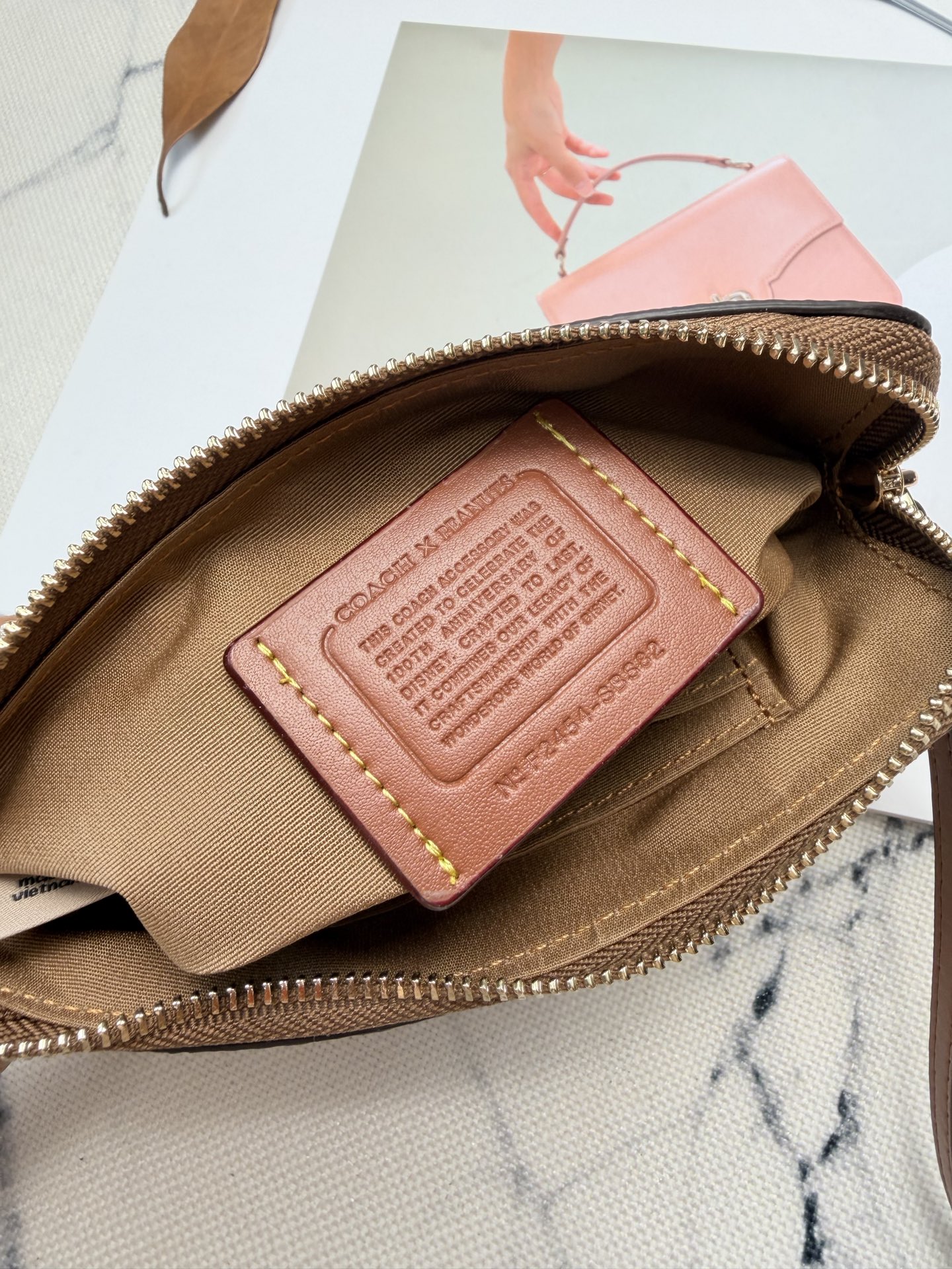Coach COACH x PEANUTS史努比联名SBS82手拿包