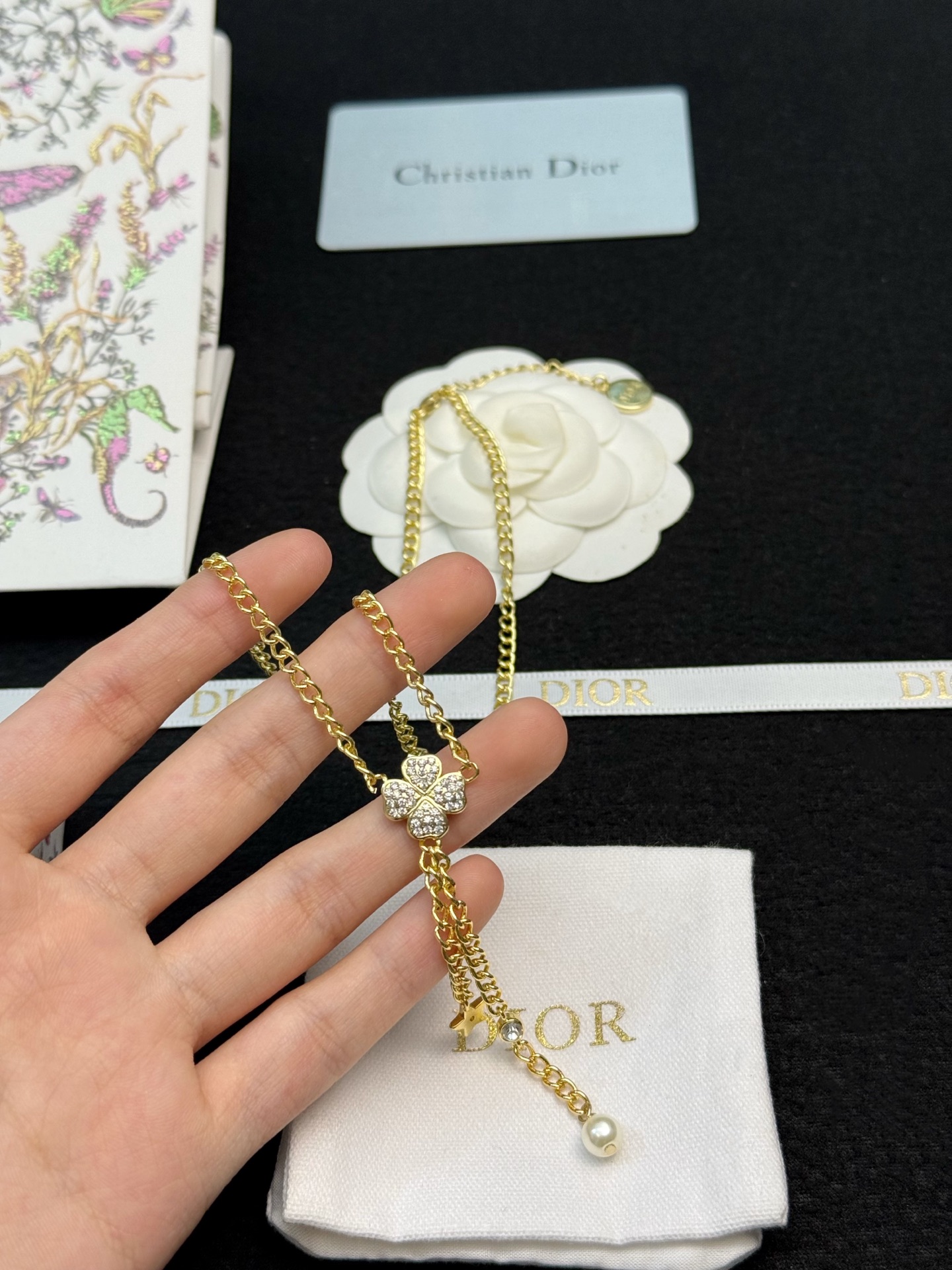 dior gold star pearl drop lariat necklace
