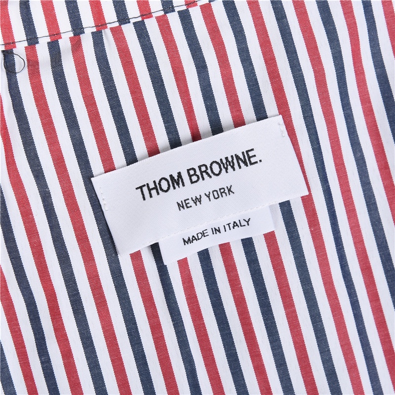 THOMBROWNE/汤姆布朗.TB经典三色拼接撞色前长后短开叉基础短裙