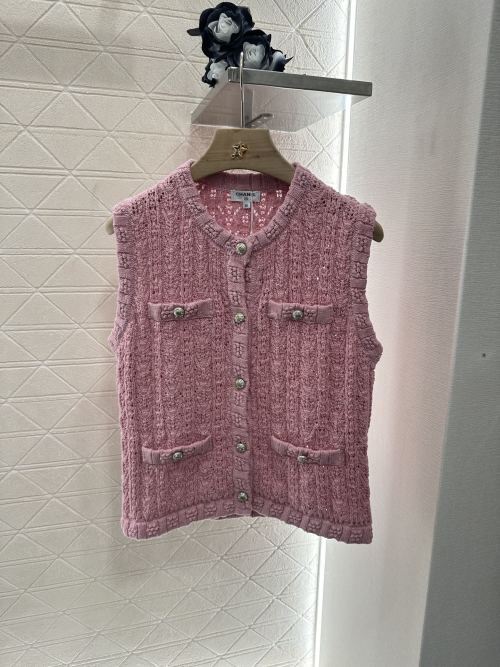 Chanel Knit Vest with Buttons, Round Neck, and Pockets - Luxurious Comfort 1 Chanel Knit Vest with Buttons, Round Neck, and Pockets - Luxurious Comfort