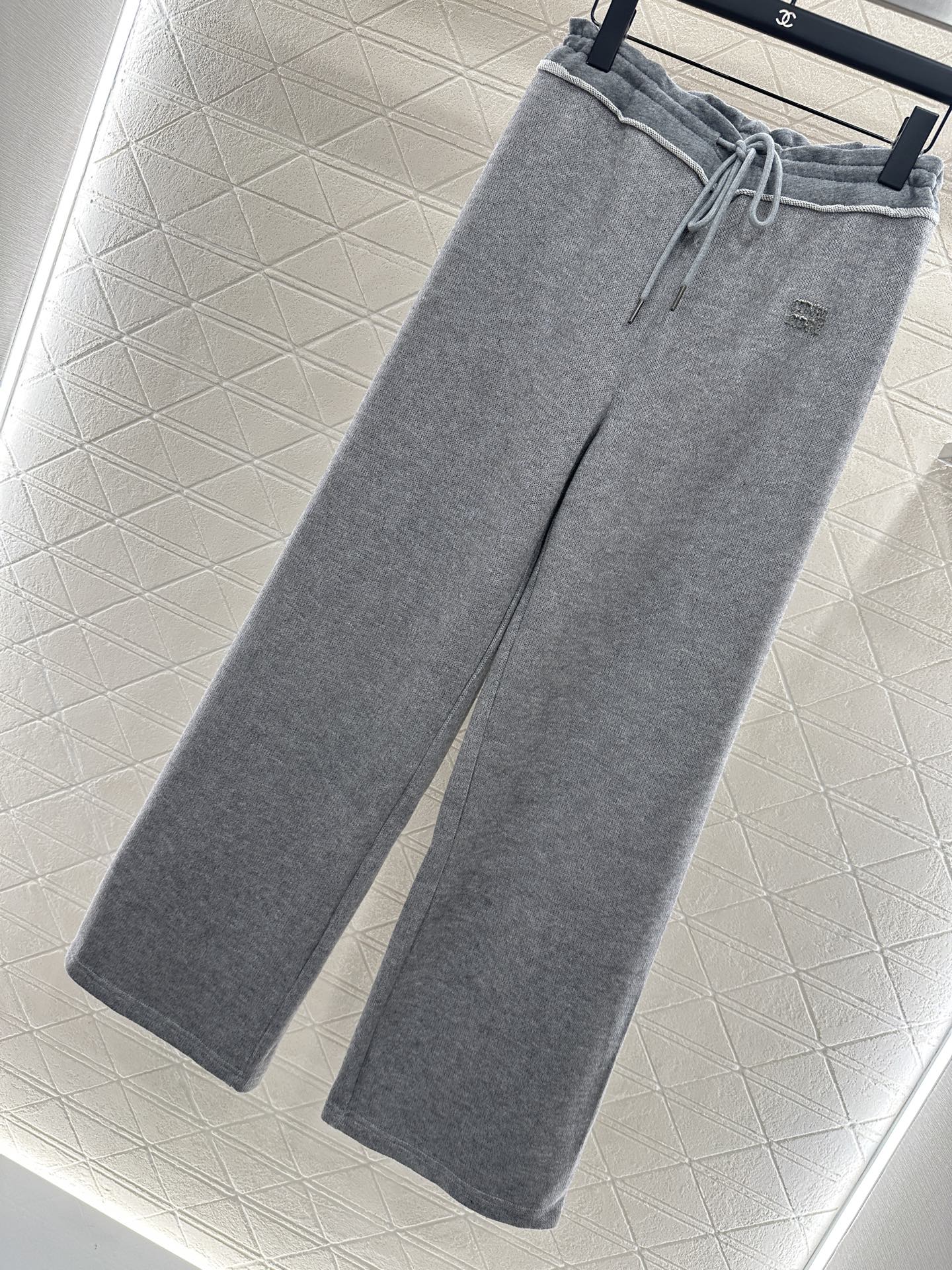 ♥Miumi*♥2025新品上架 拼接感抽绳阔腿长裤定制YB进口羊毛混纺材质，面料柔挺舒适，垂顺有型，高