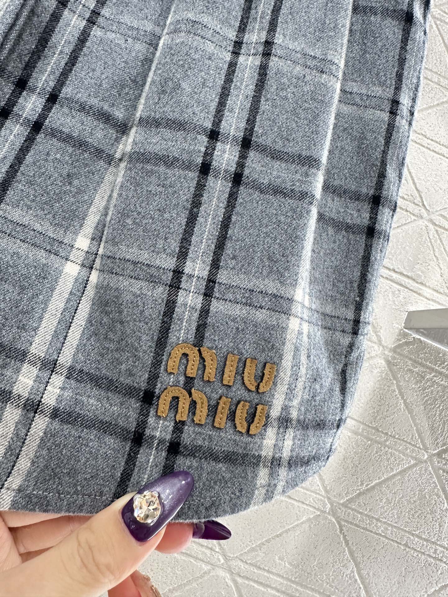 ♥Miumi♥2025新品上架 对格对条格纹高腰弹力半裙通体饰以全棉毛呢材质，质感柔软舒适，时髦洋气，松