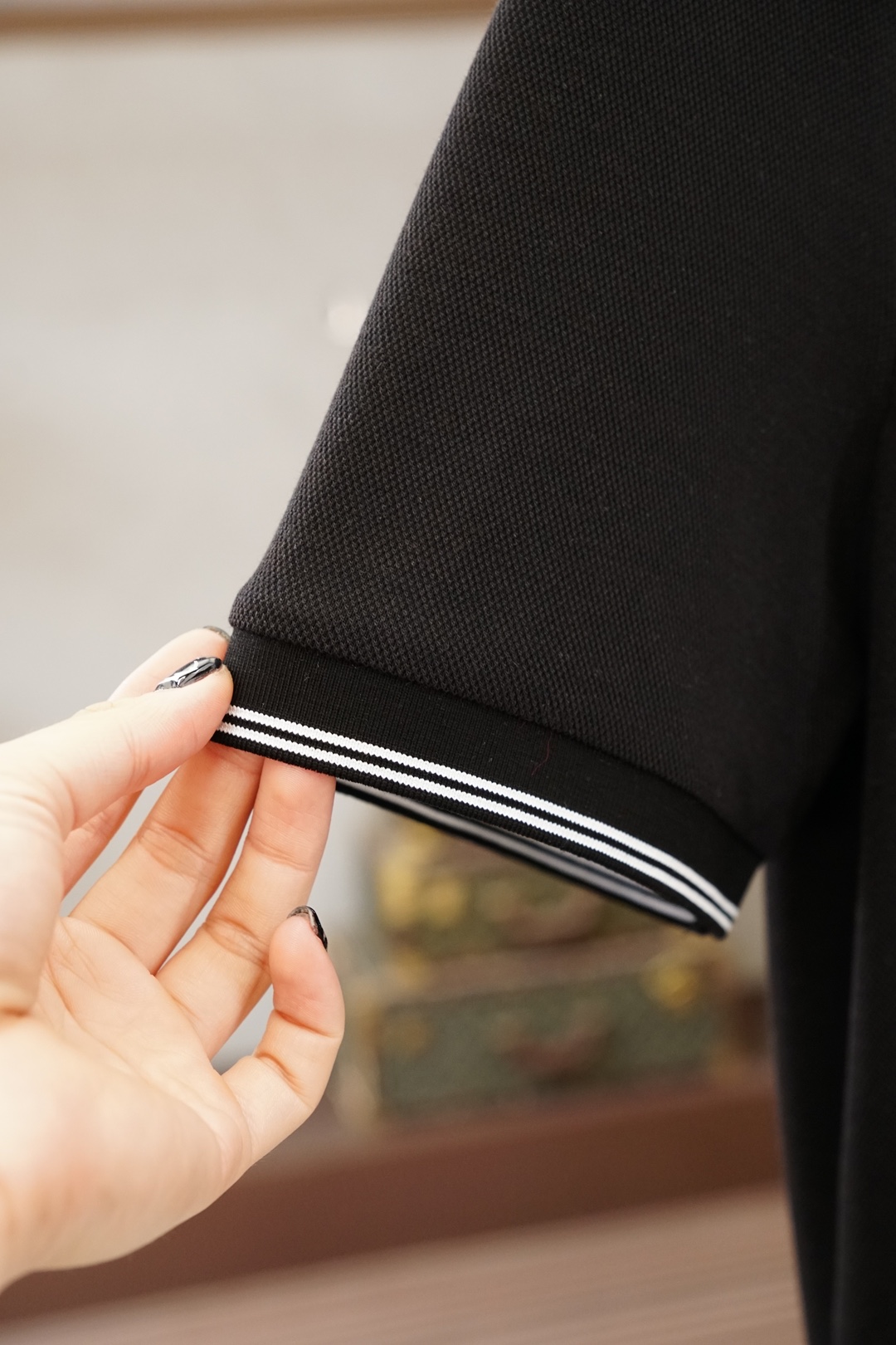 DIOR 迪奥/2026双面羊毛珠地 Polo 衫甄选双面羊毛珠地面料，羊毛的温润与珠地网眼的透气完美融
