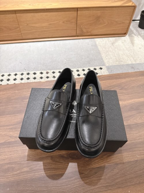 Prada Men's Black Leather Penny Loafers With Silver-Tone Logo Accent 1 Prada Men's Black Leather Penny Loafers With Silver-Tone Logo Accent