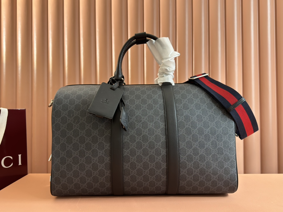 Gucci 24 launches new GG travel bag. Classic Supreme black GG Supreme series, black cowhide piping, red and blue webbing, cotton and linen blend