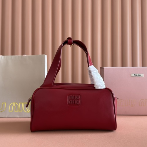 Miu Miu Leather Handbag: Compact, Functional, and Exquisitely Crafted 1 Miu Miu Leather Handbag: Compact, Functional, and Exquisitely Crafted