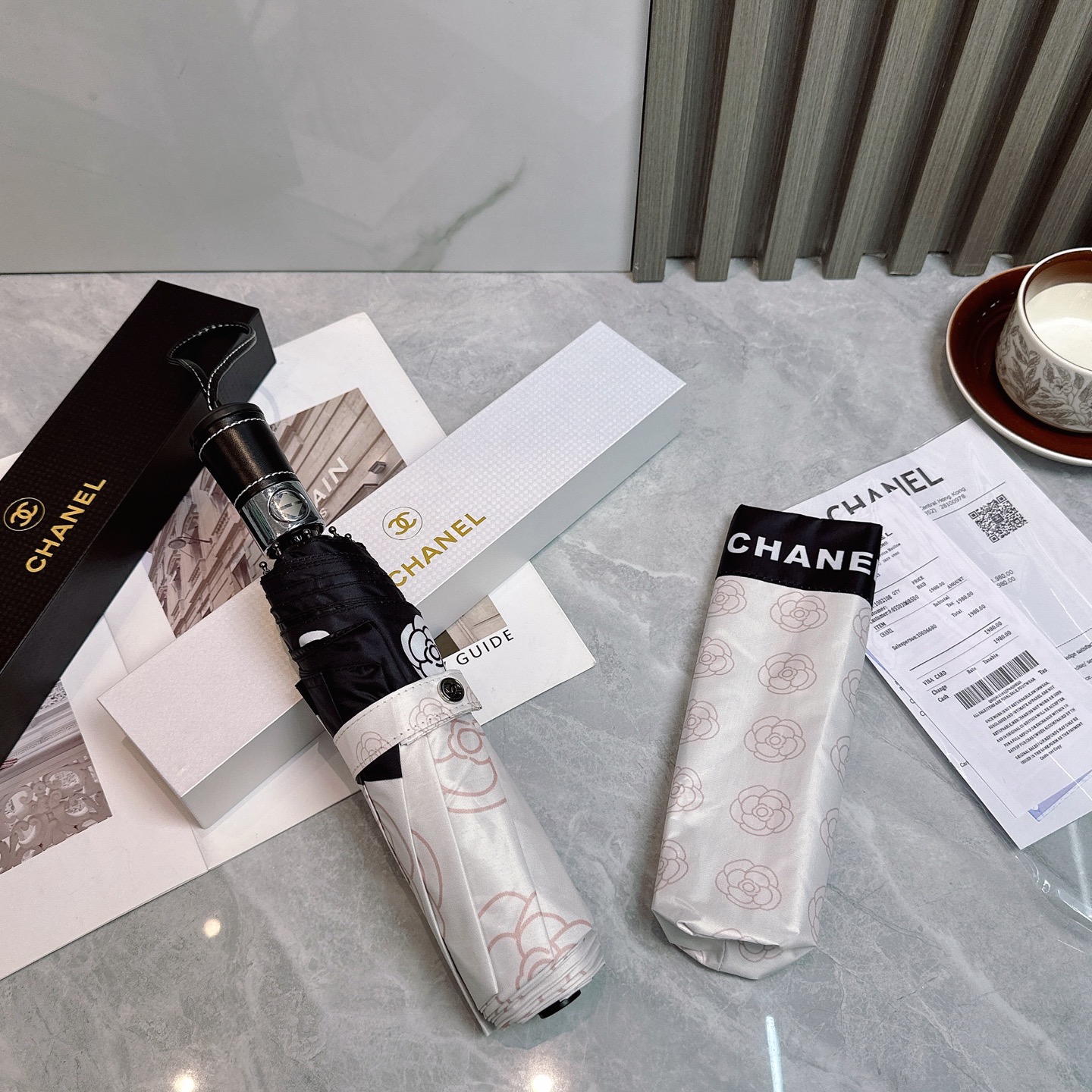 CHANEL（香奈儿）夏季新款 2025全自动折叠晴雨伞 
黑色涂层防晒有效阻隔紫外线99%，UPF>