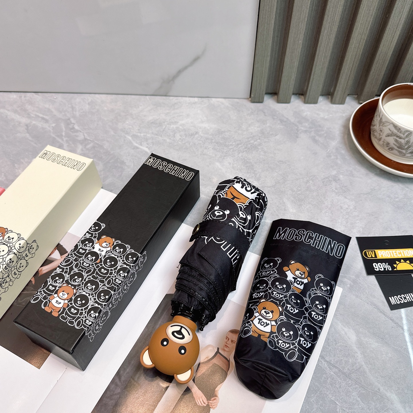   Moschino（莫斯奇诺） 新款 五折 折叠晴雨伞  时尚原单代工品质 细节精致 看得见的品质 打