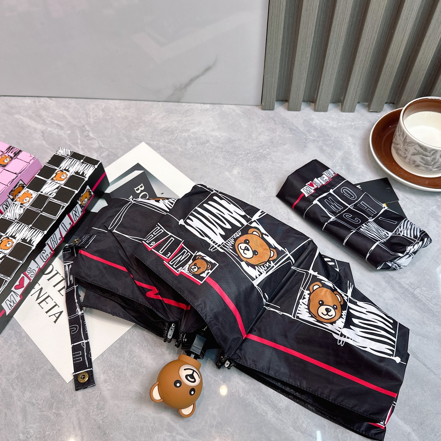   Moschino（莫斯奇诺） 新款 五折 折叠晴雨伞  时尚原单代工品质 细节精致 看得见的品质 打
