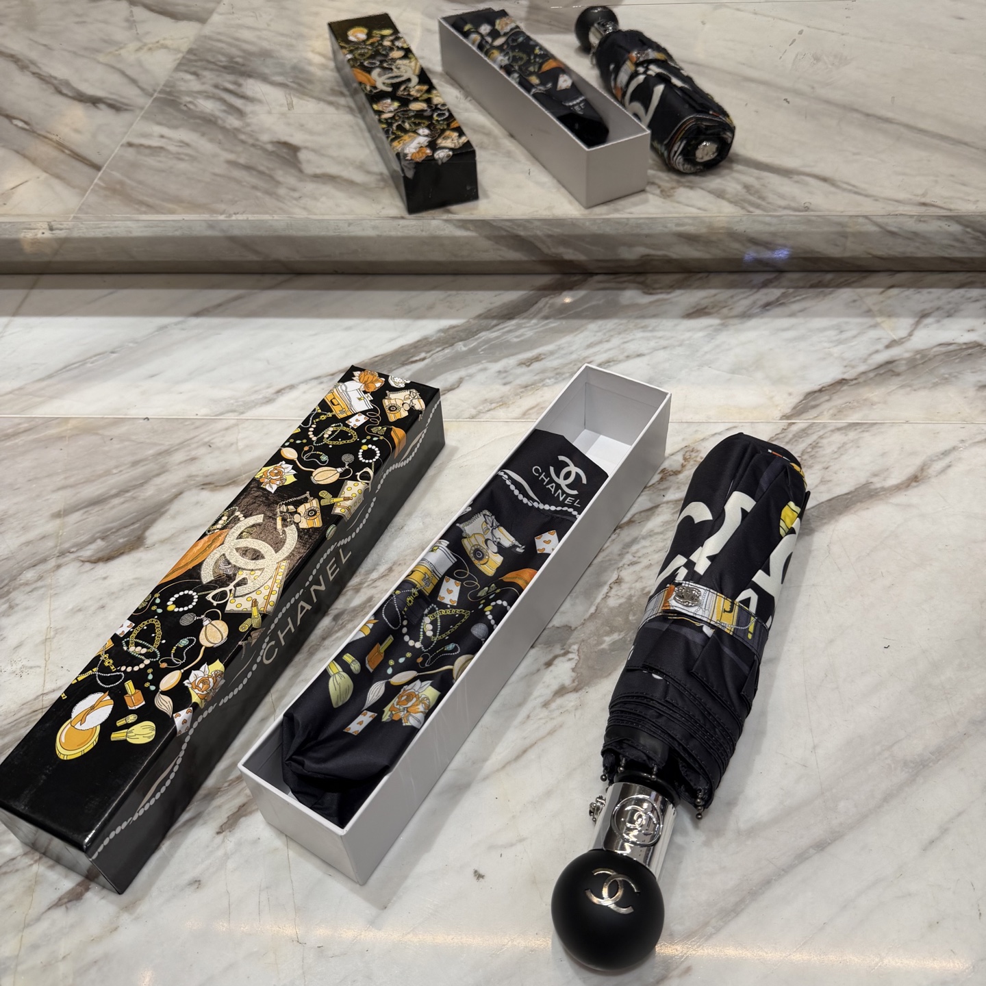 CHANEL（香奈儿）夏季新款 全自动折叠晴雨伞 黑色涂层防晒有效阻隔紫外线99%，UPF>50 所以能