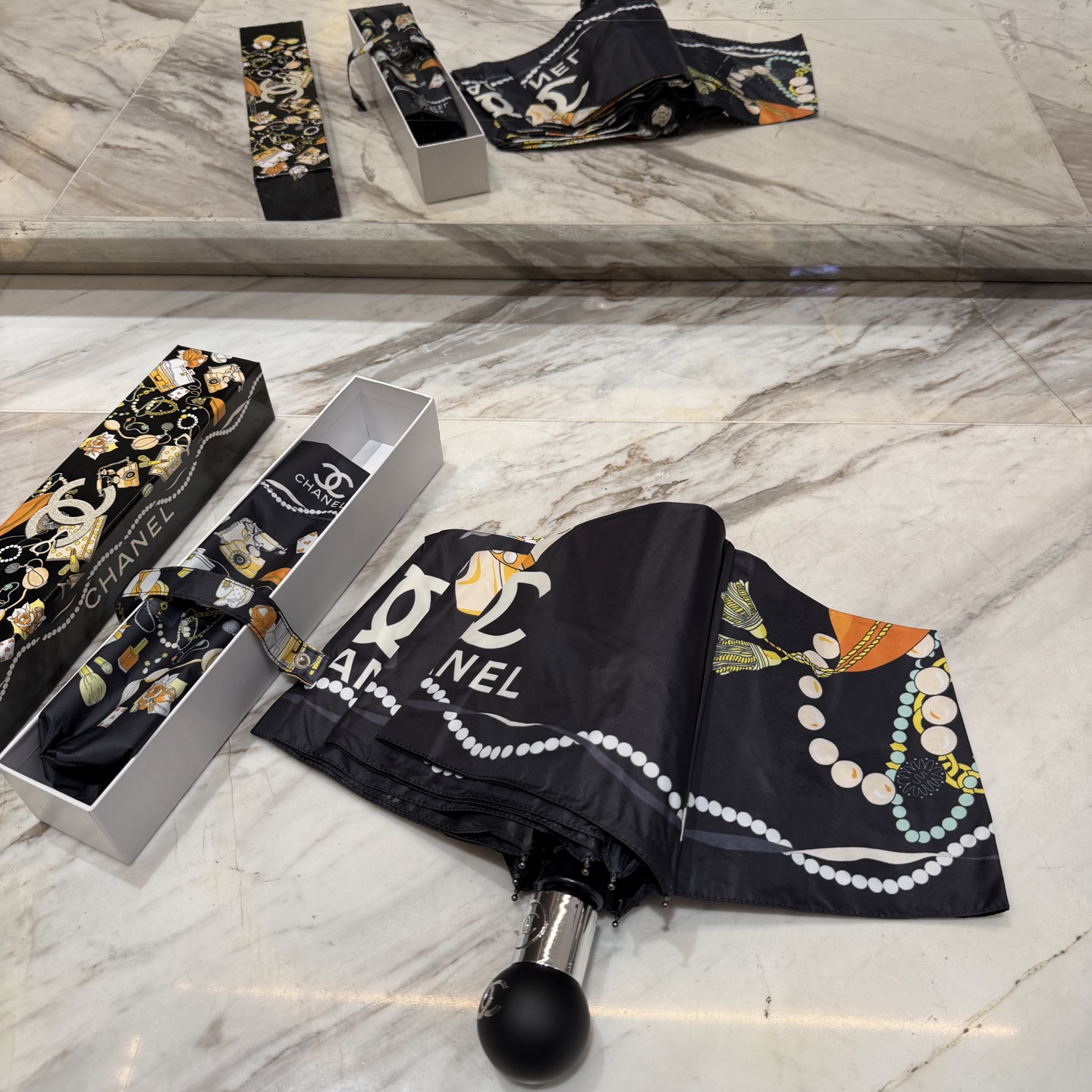 CHANEL（香奈儿）夏季新款 全自动折叠晴雨伞 黑色涂层防晒有效阻隔紫外线99%，UPF>50 所以能