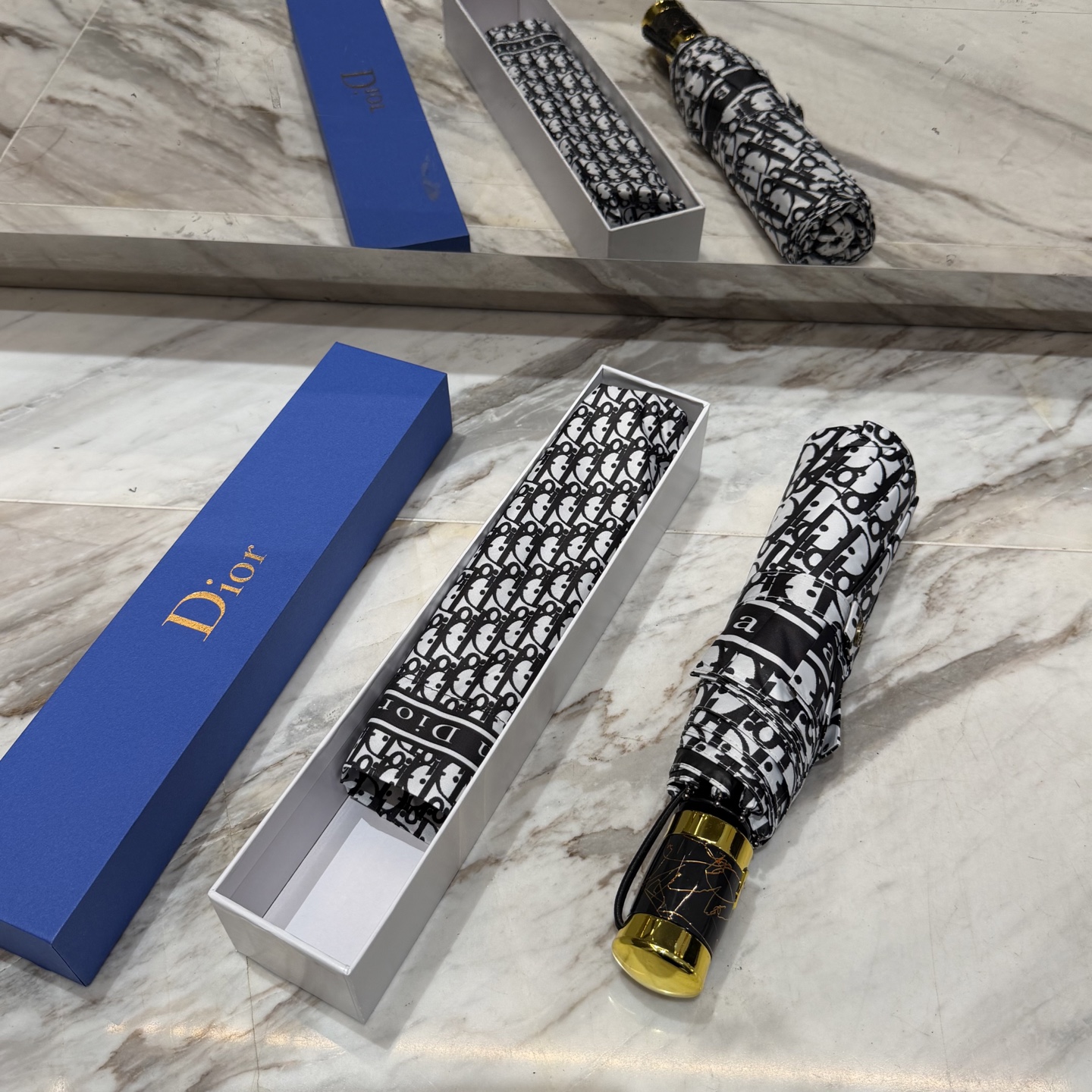 迪奥Dior 三折防晒睛雨伞。。夏季新款 全自动折叠晴雨伞 内里黑色涂层防晒有效阻隔紫外线99%，UPF