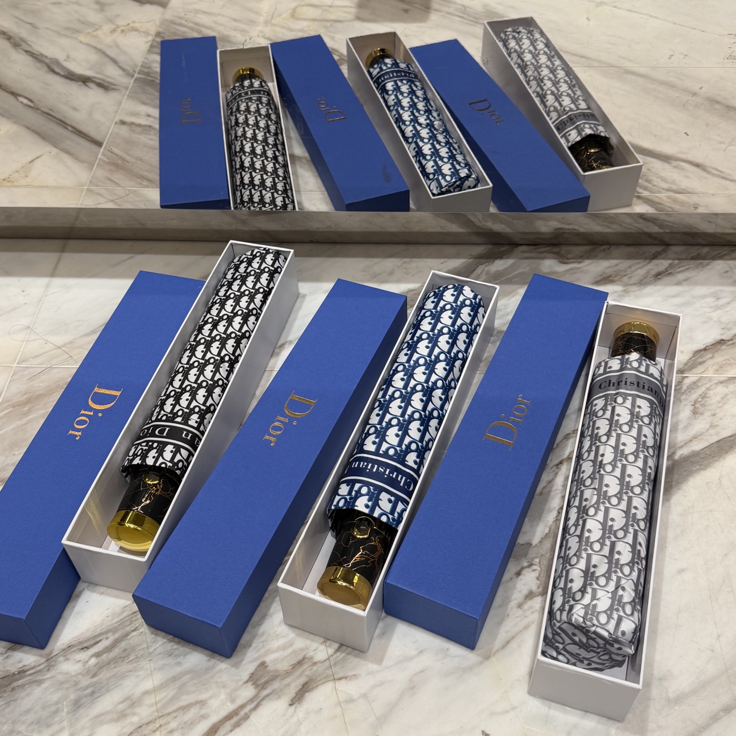 迪奥Dior 三折防晒睛雨伞。。夏季新款 全自动折叠晴雨伞 内里黑色涂层防晒有效阻隔紫外线99%，UPF