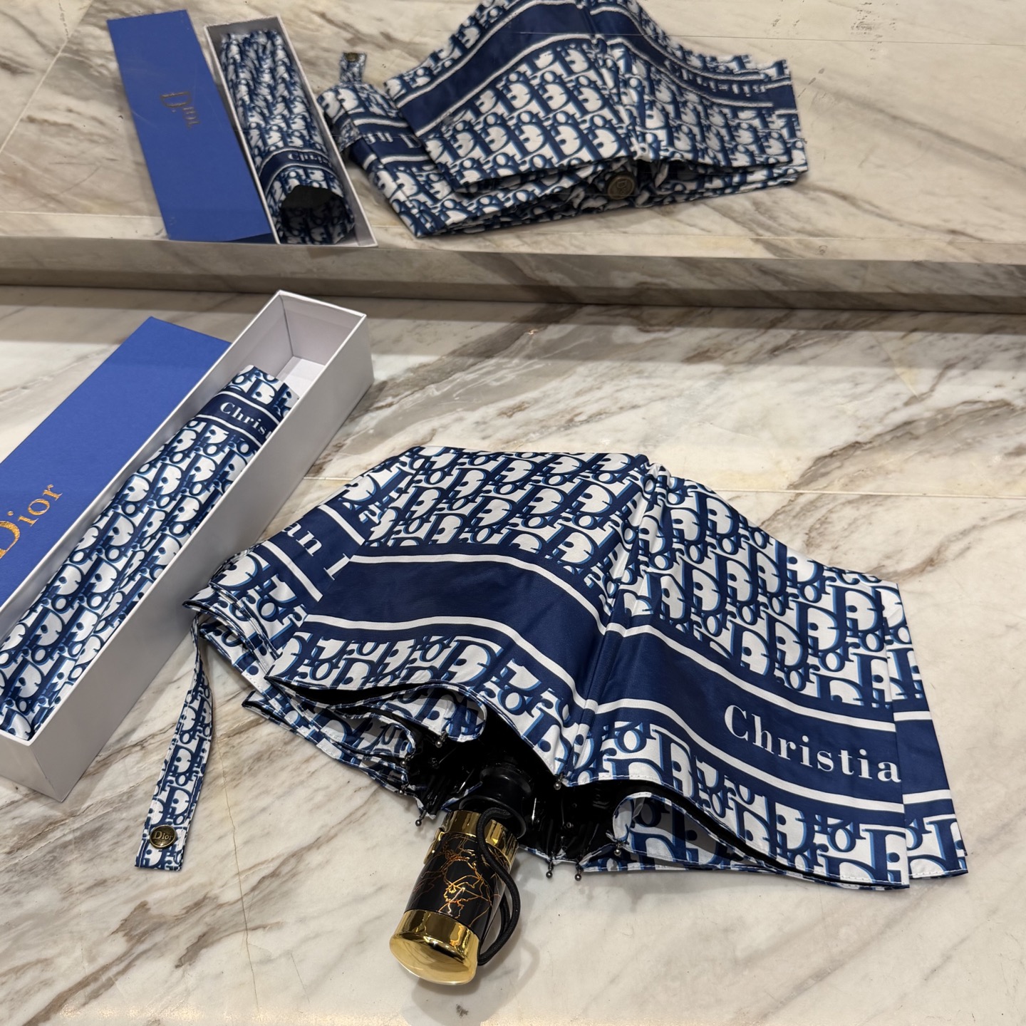 迪奥Dior 三折防晒睛雨伞。。夏季新款 全自动折叠晴雨伞 内里黑色涂层防晒有效阻隔紫外线99%，UPF