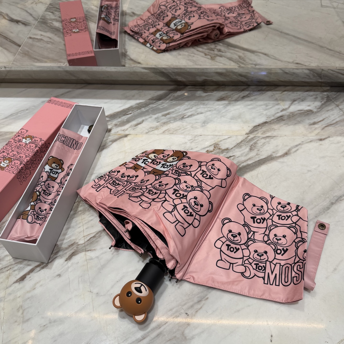 莫斯奇诺 MOSCHINO三折防晒睛雨伞。。 2025夏季新款 全自动折叠晴雨伞 内里黑色涂层防晒有效阻