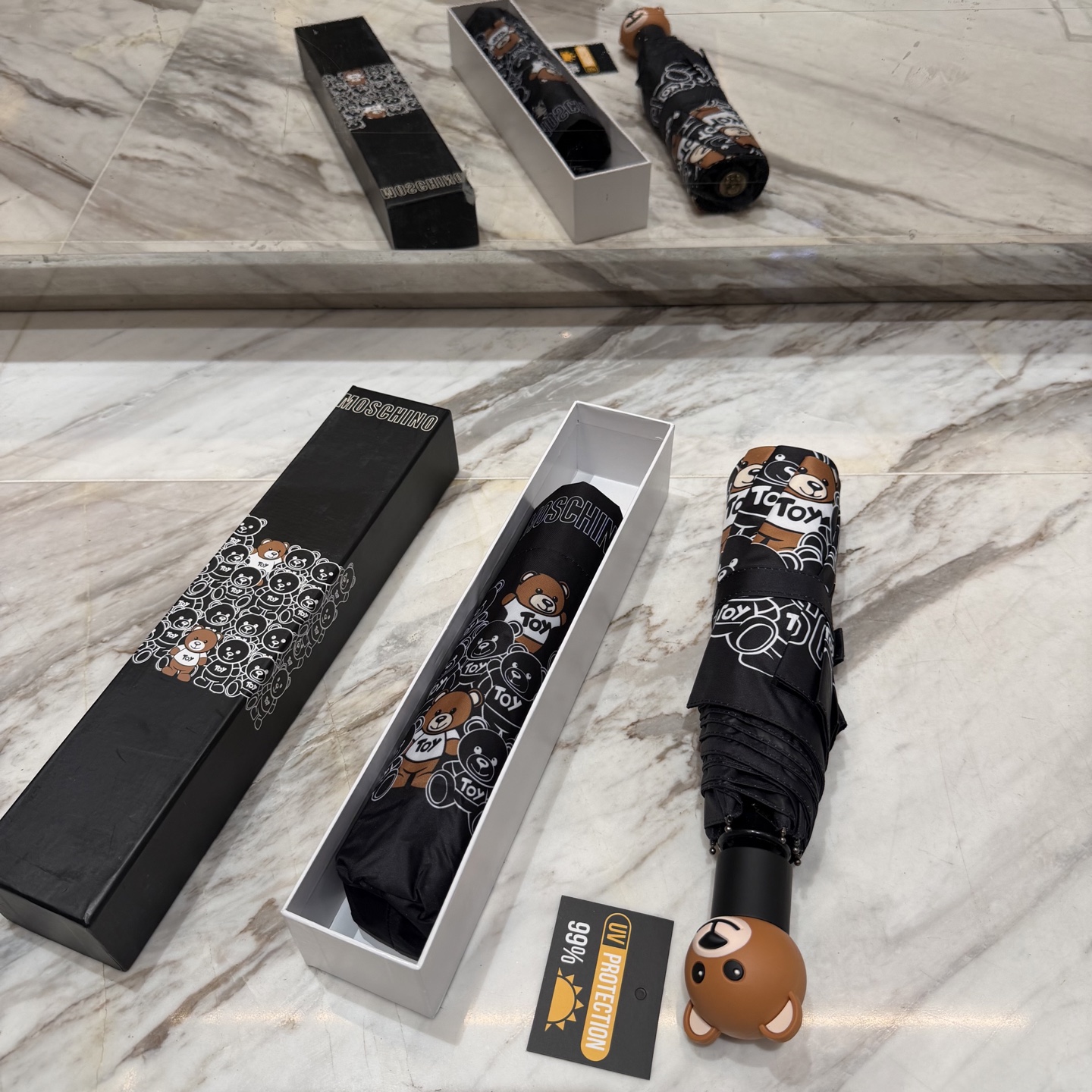 莫斯奇诺 MOSCHINO三折防晒睛雨伞。。 2025夏季新款 全自动折叠晴雨伞 内里黑色涂层防晒有效阻