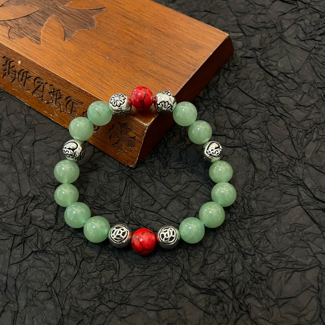  新款【专柜品质】Chrome Hearts克罗心 经典复古多元素绿猫眼手链手串，凹凸造型不同的花纹设计
