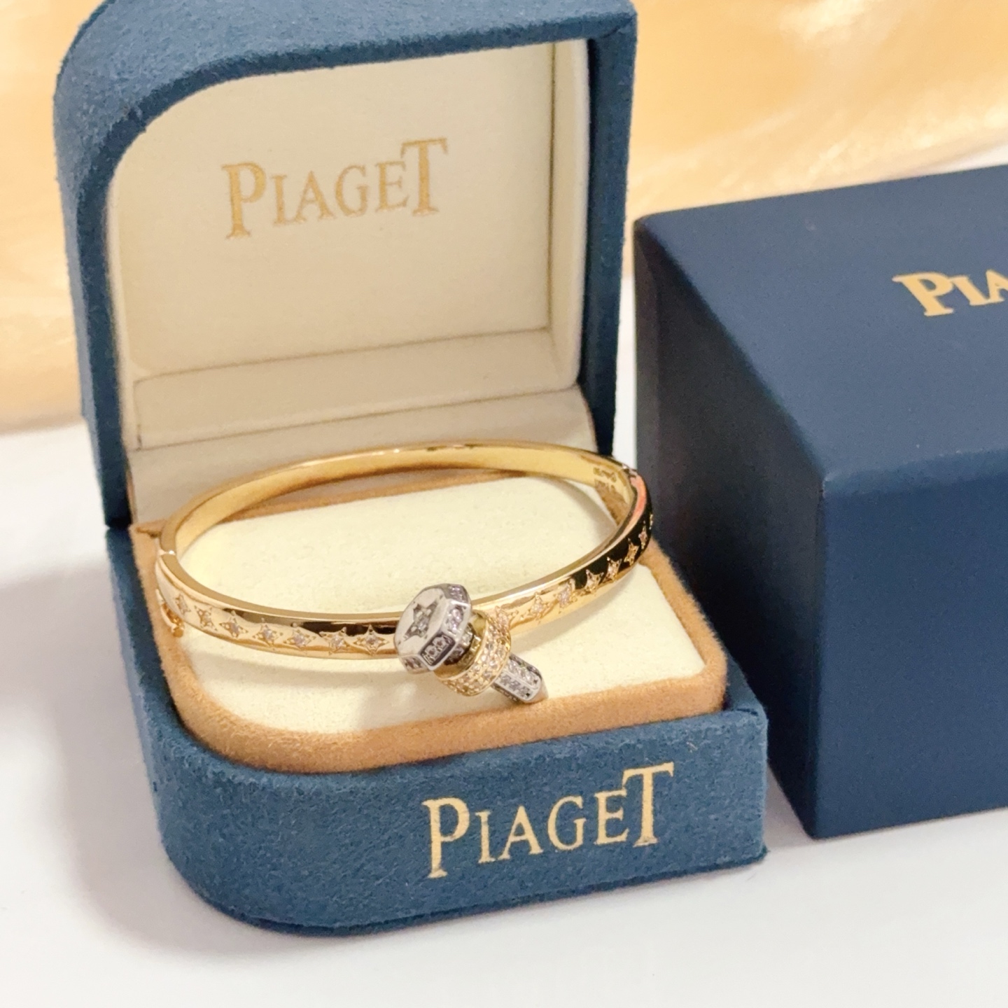Piaget Possibly Piaget bracelet watch (bangle style) Yellow gold case / diamond-set bezel / gold dial / gold bangle bracelet 20mm Women's Quartz