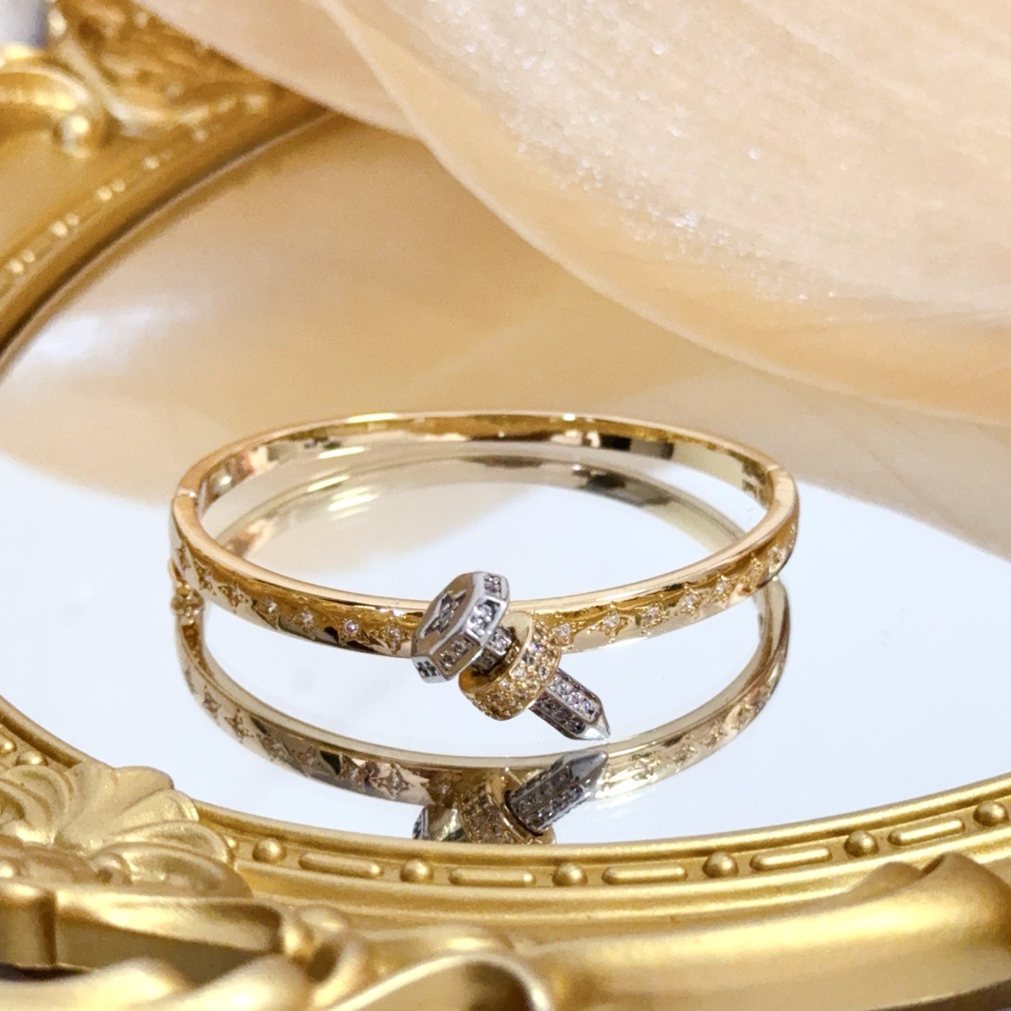Piaget Possibly Piaget bracelet watch (bangle style) Yellow gold case / diamond-set bezel / gold dial / gold bangle bracelet 20mm Women's Quartz