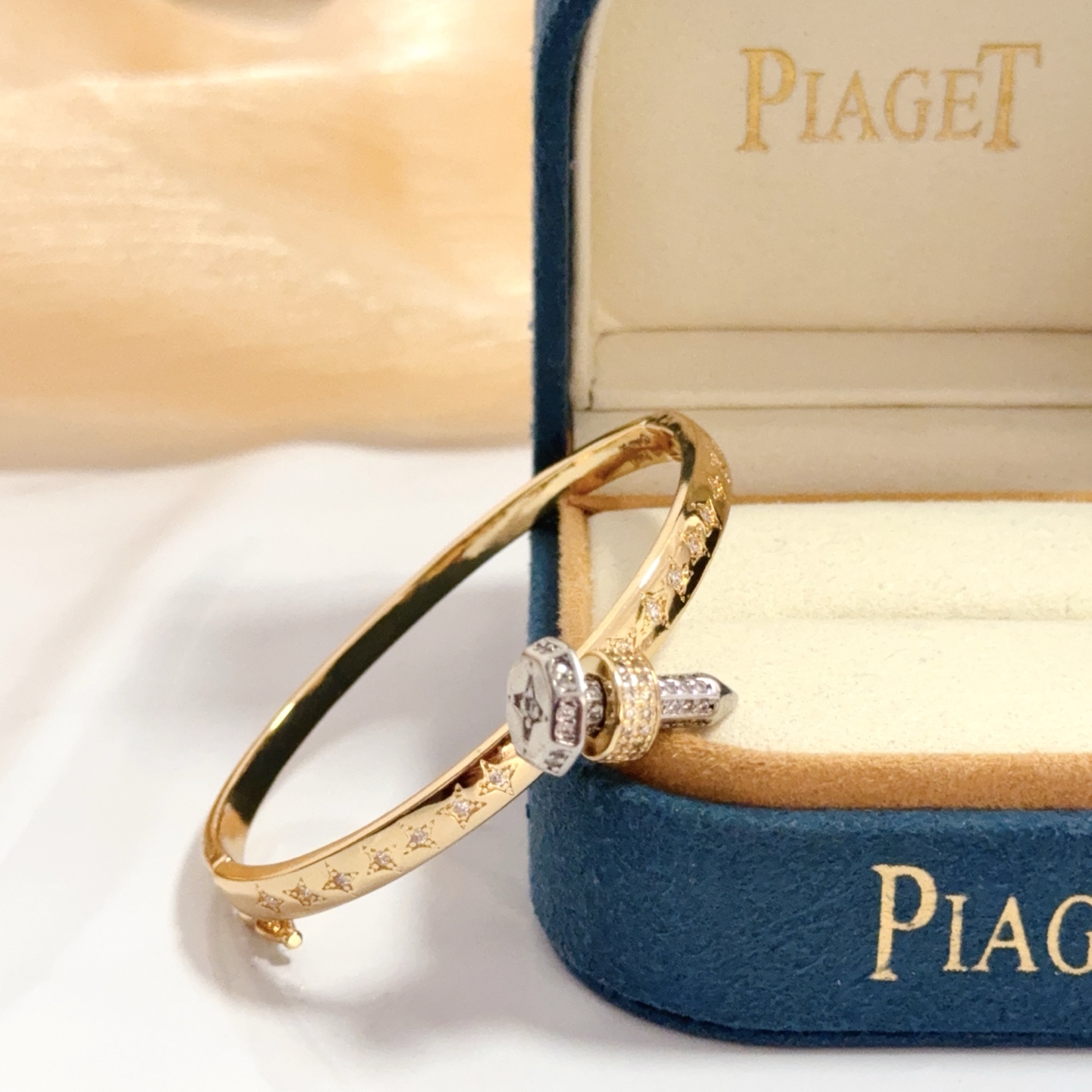 Piaget Possibly Piaget bracelet watch (bangle style) Yellow gold case / diamond-set bezel / gold dial / gold bangle bracelet 20mm Women's Quartz