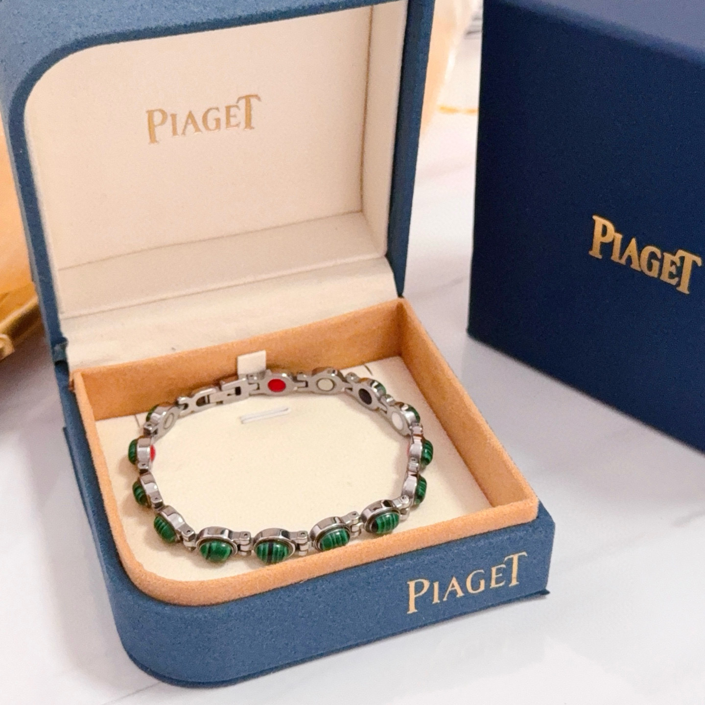 Piaget Possibly Limelight bracelet watch white gold case and bracelet, green stone accents, no visible dial 0mm Women's Quartz