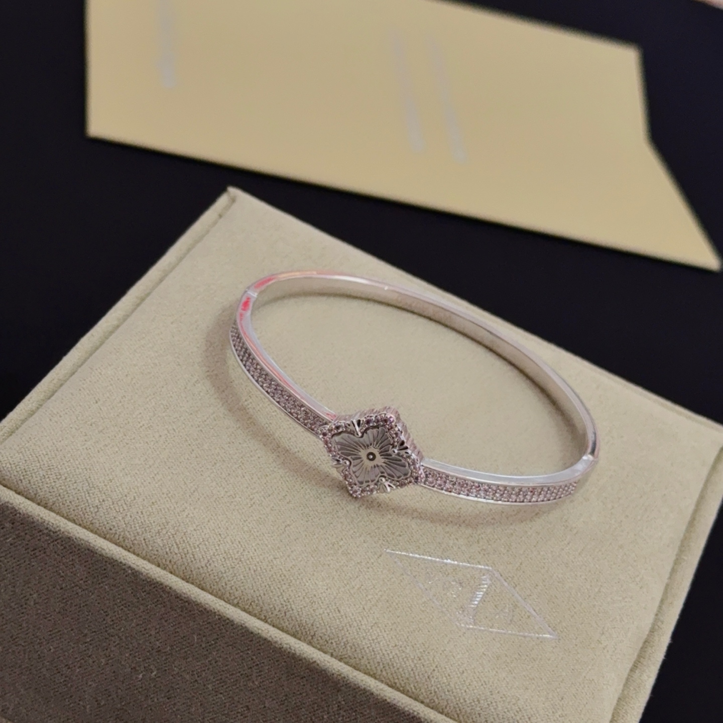Van Cleef Arpels Alhambra bracelet silver-toned metal with clear diamond accents and silver guilloche clover motif 17cm