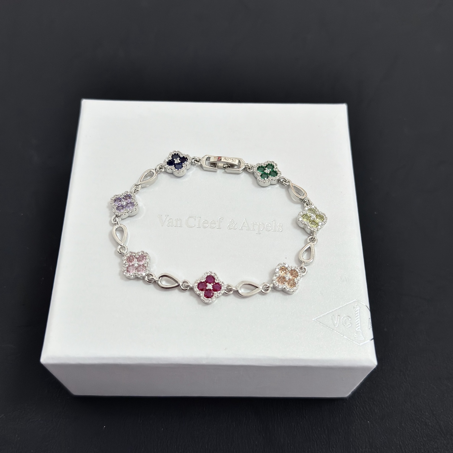 Van Cleef Arpels Alhambra bracelet Silver-toned metal with multicolor gemstones pink red champagne yellow purple dark blue green accented by white diamonds 17cm
