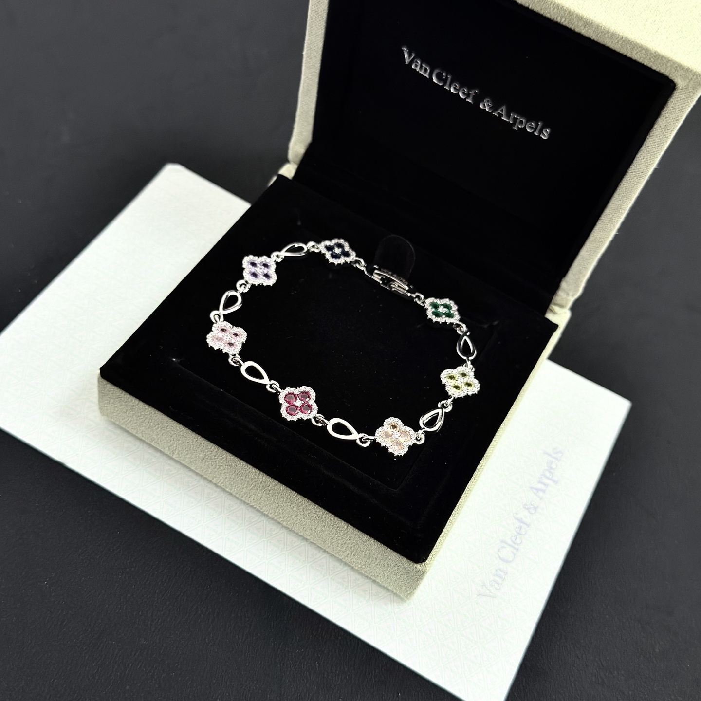 Van Cleef Arpels Alhambra bracelet Silver-toned metal with multicolor gemstones pink red champagne yellow purple dark blue green accented by white diamonds 17cm
