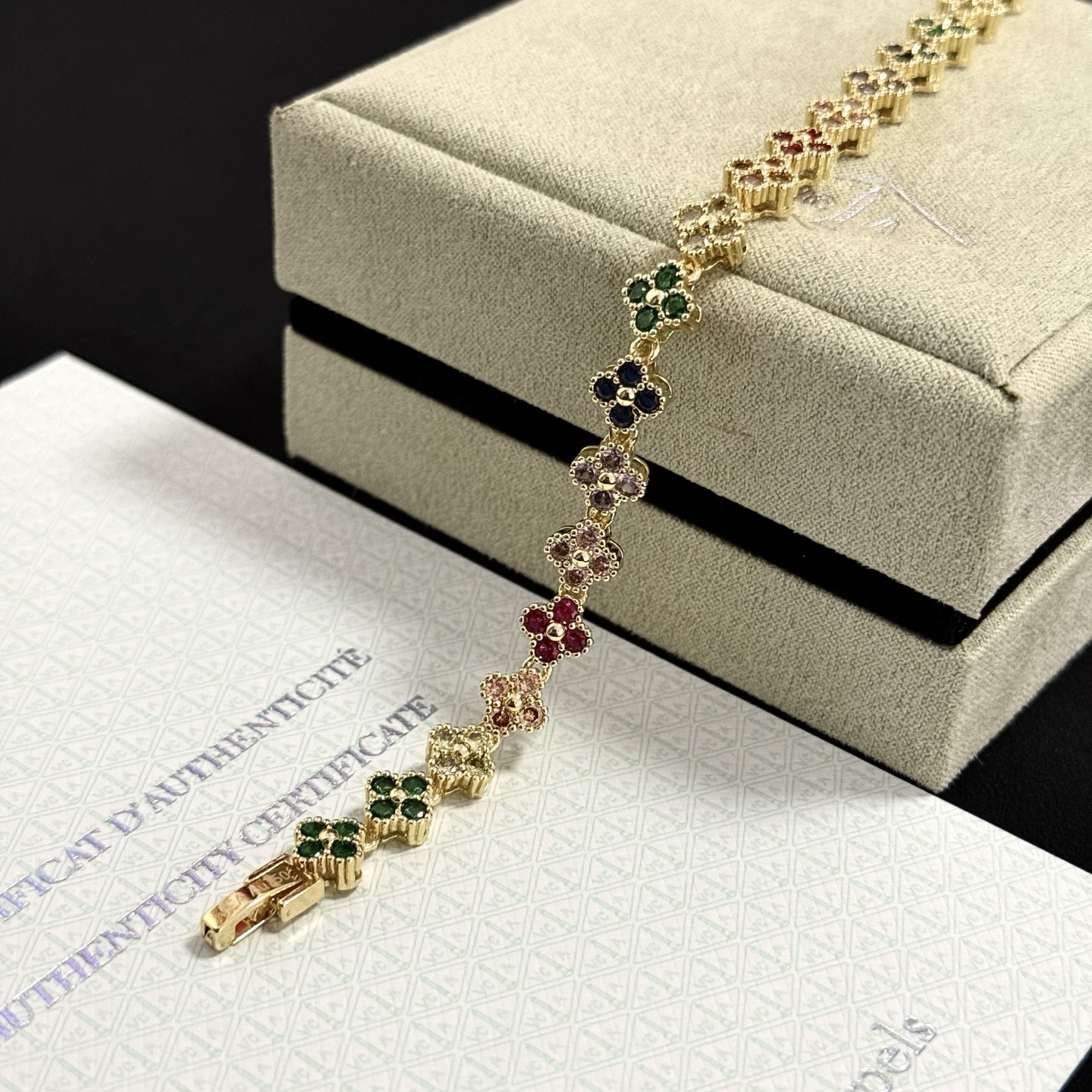 Van Cleef Arpels Alhambra bracelet yellow gold with multicolor gemstones green red black light pink purple champagne 18cm