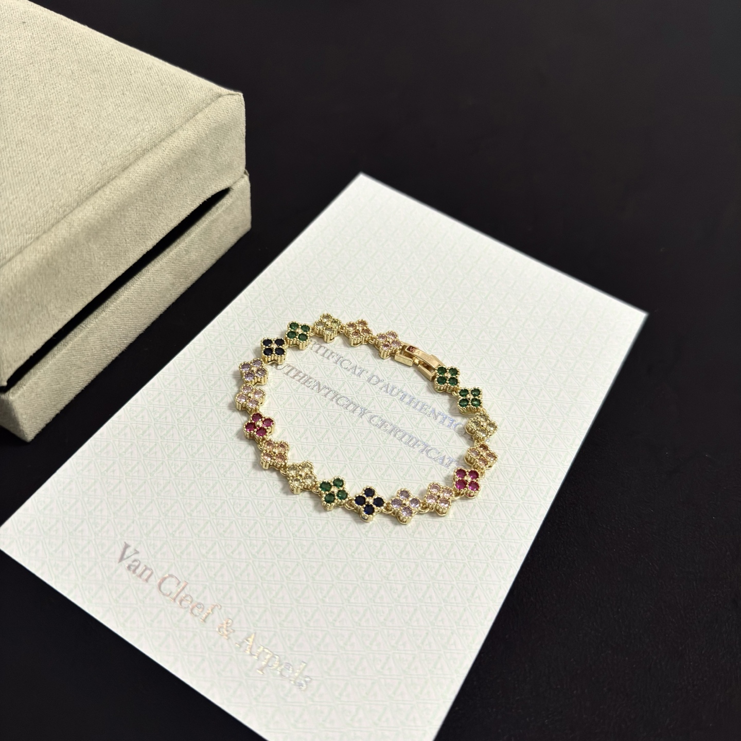 Van Cleef Arpels Alhambra bracelet yellow gold with multicolor gemstones green red black light pink purple champagne 18cm