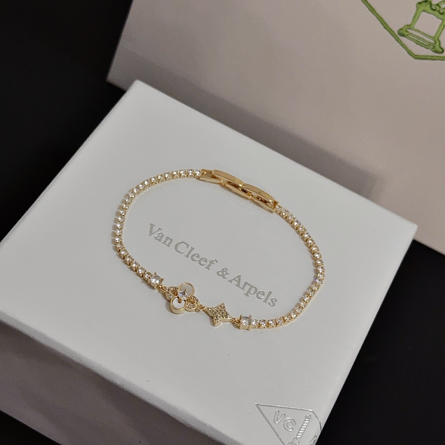 Van Cleef Arpels Alhambra bracelet yellow gold with clear diamond accents and mother-of-pearl detail 17cm