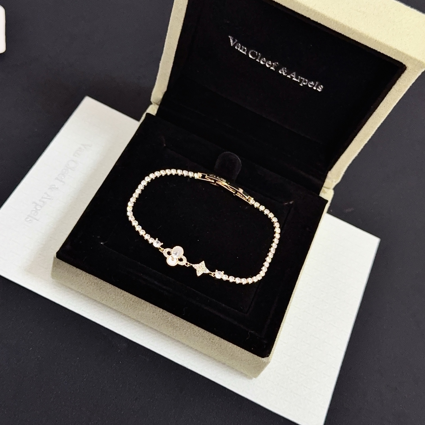 Van Cleef Arpels Alhambra bracelet yellow gold with clear diamond accents and mother-of-pearl detail 17cm