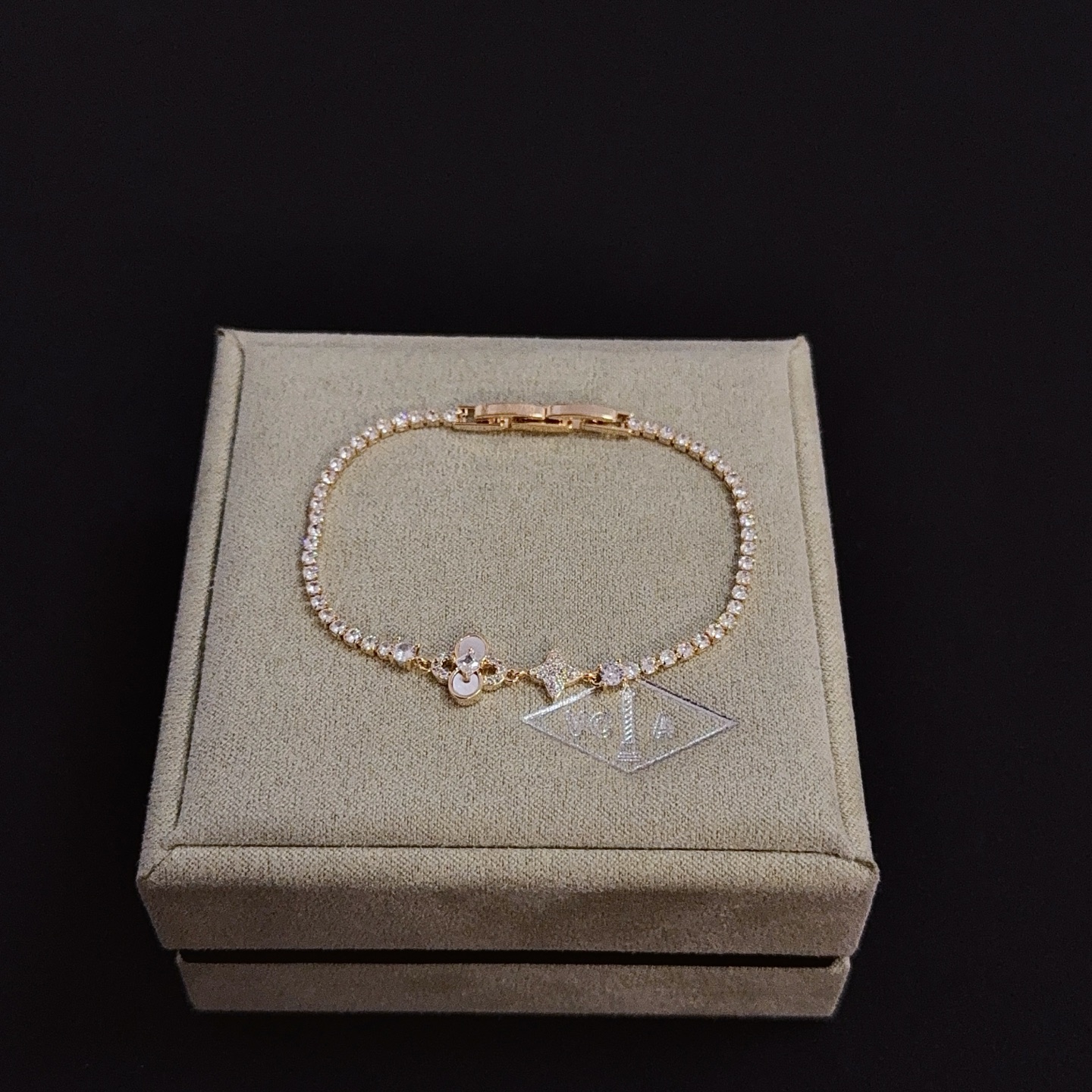 Van Cleef Arpels Alhambra bracelet yellow gold with clear diamond accents and mother-of-pearl detail 17cm