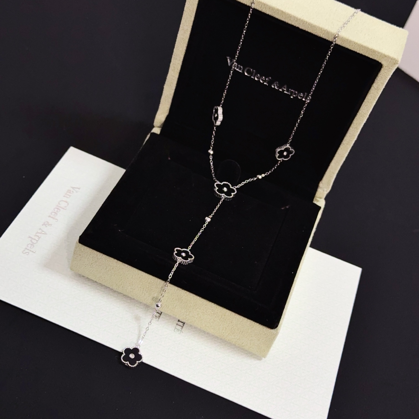 Van Cleef Arpels Alhambra necklace white gold metal black onyx clover motifs diamond center accents 42cm with 5cm extender