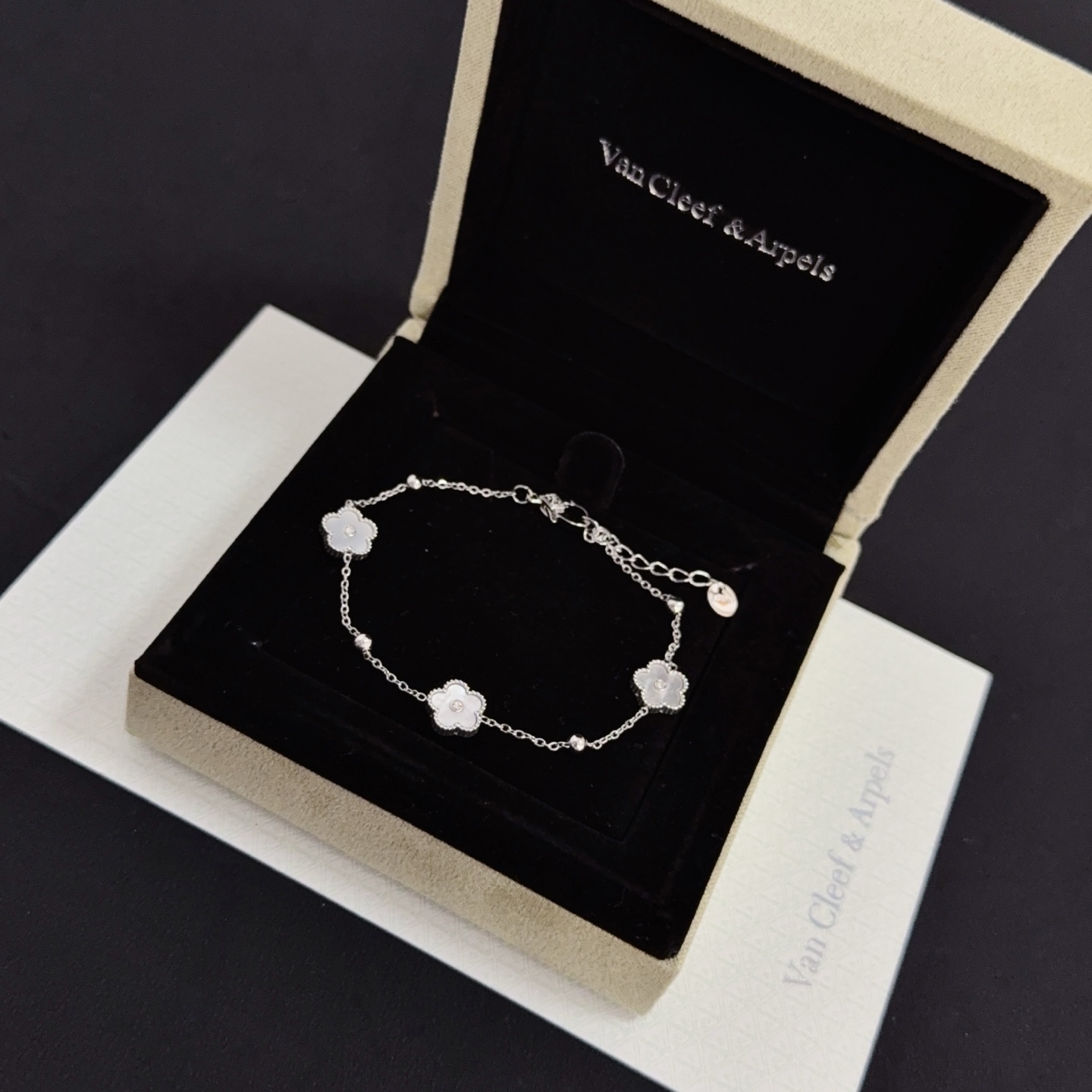 Van Cleef Arpels Alhambra bracelet silver-toned metal white mother-of-pearl clear diamond accents 17cm