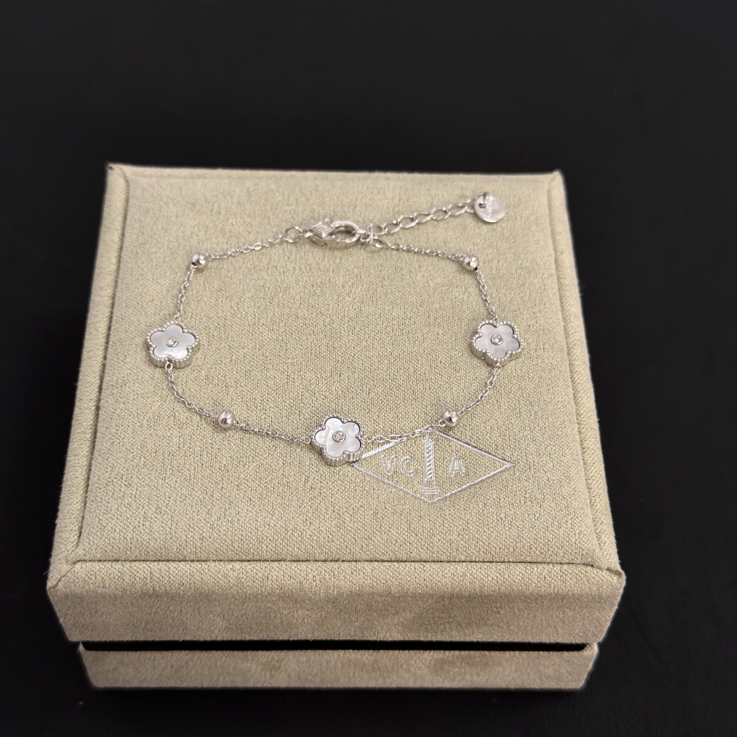 Van Cleef Arpels Alhambra bracelet silver-toned metal white mother-of-pearl clear diamond accents 17cm